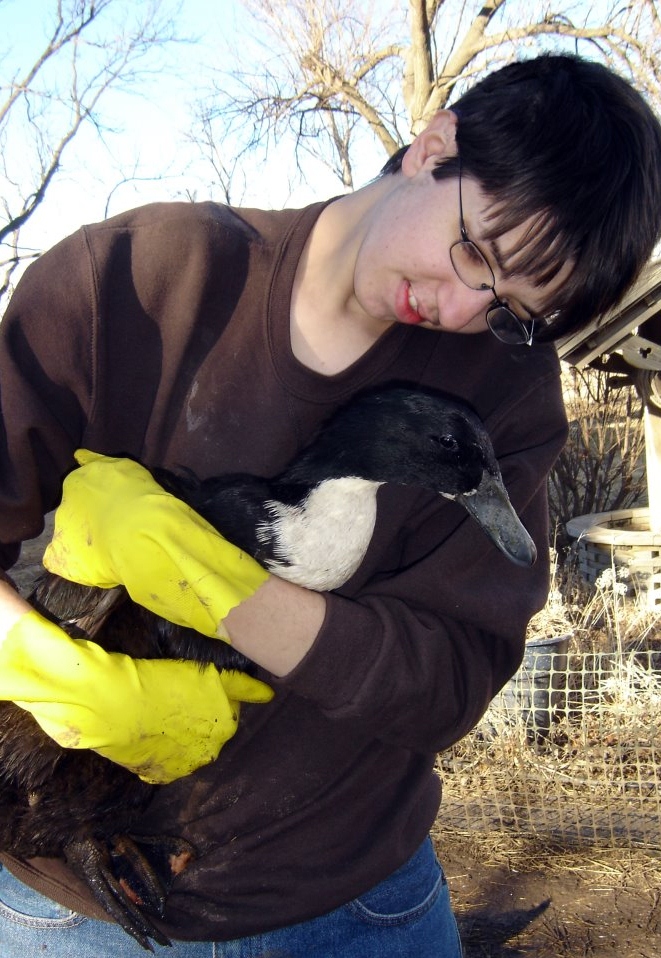 Of course, duck-keeping isn't all grins and giggles; sometimes it's hard, dirty work. I'm very lucky to have willing helpers.
