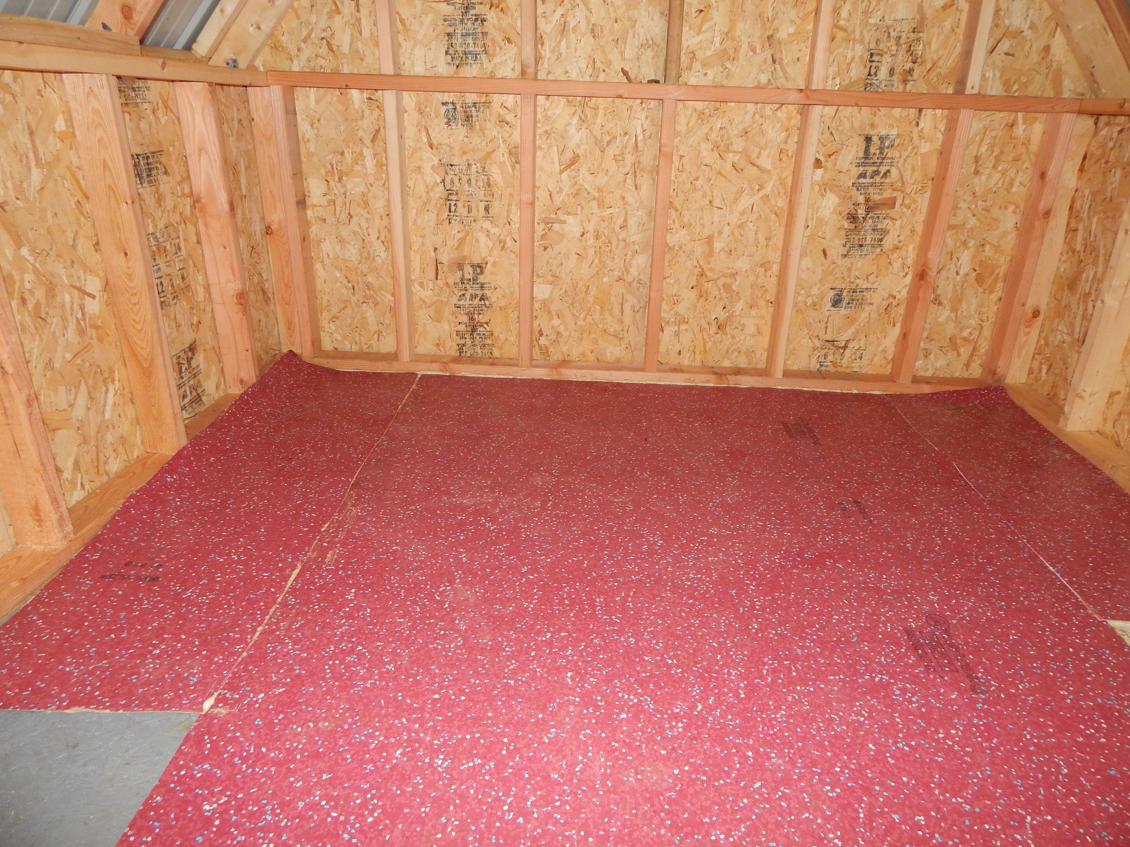 oops ran out of linoleum that I purchased for 5.00 at resale store. But I have some odd ball pieces laying around that will fill in the void. Won't match but you won't see it after a while anyways!
Door should be put on today and then windows and run. almost there.