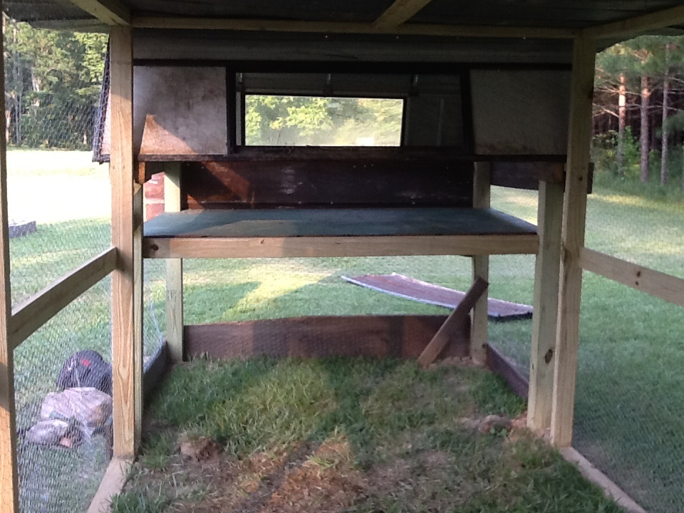 Other end of coop where they can sleep if they want.......once we install roosting bars