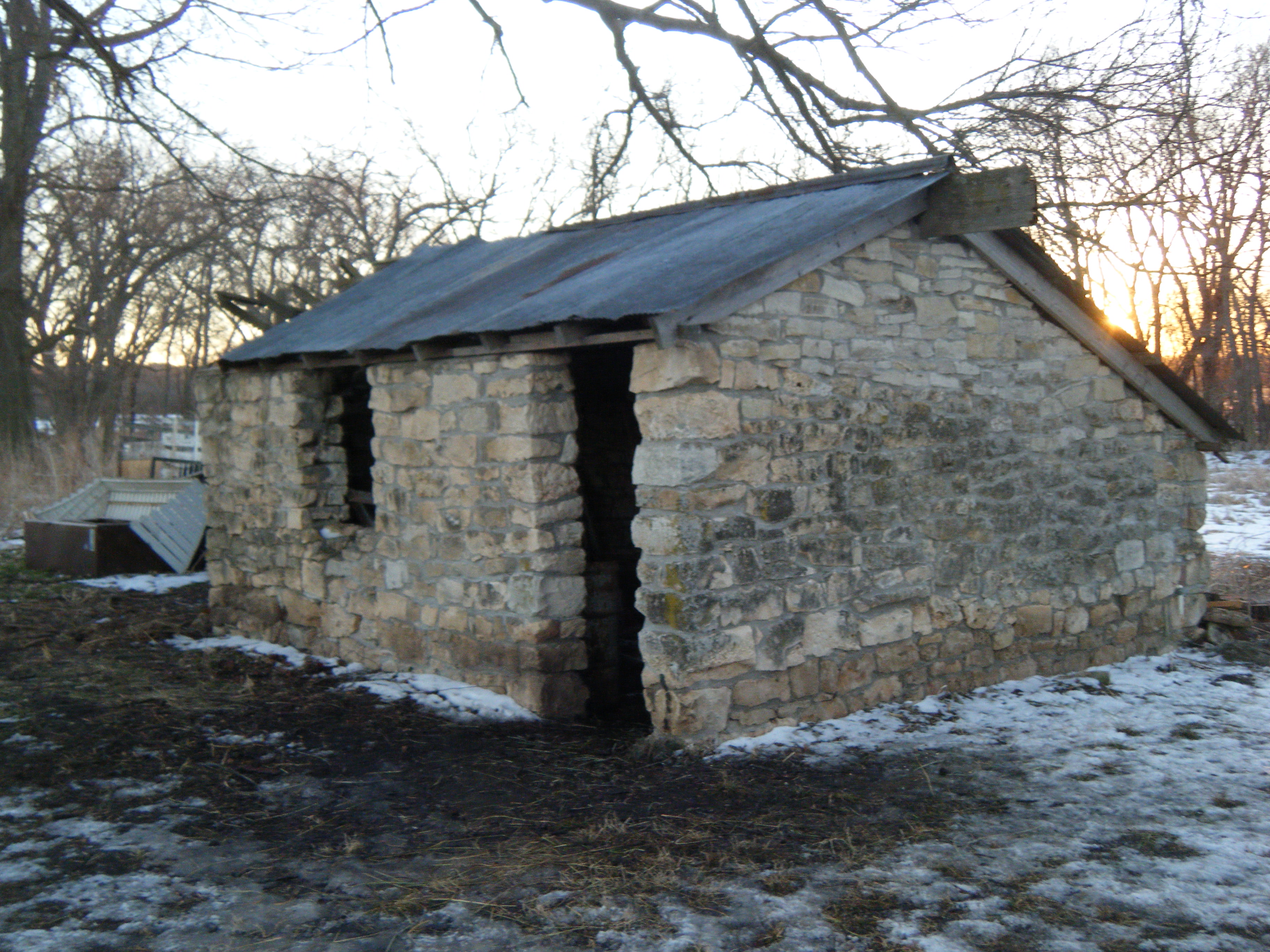 Our feed/garden shed.   We call it the Stone Shed :P