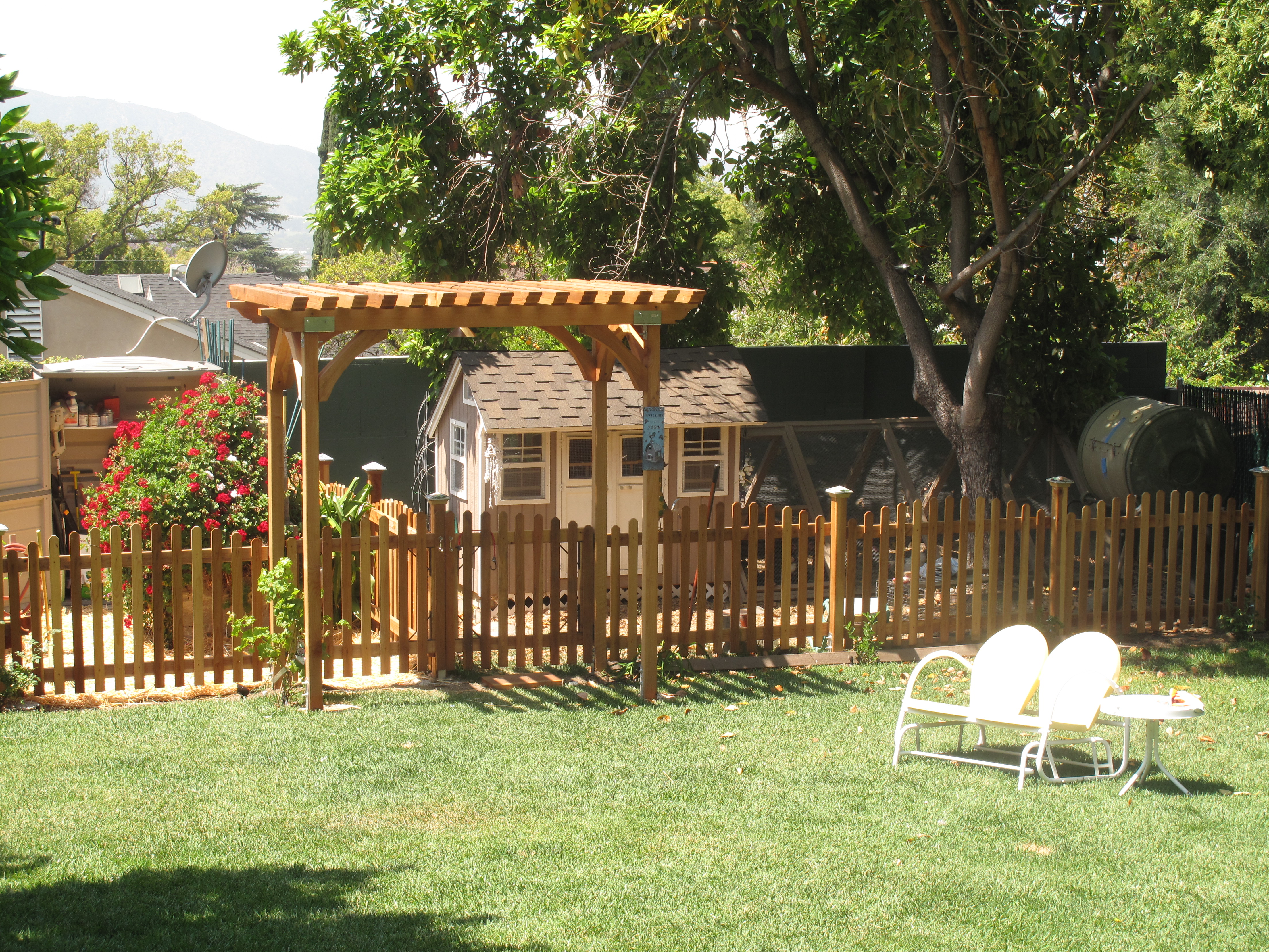 Our new fencing to separate the hens from the garden!  Finally finished, yippee.  The girls can come out their own gate into the yard and have a great time without eating the entire garden like they did this past winter!