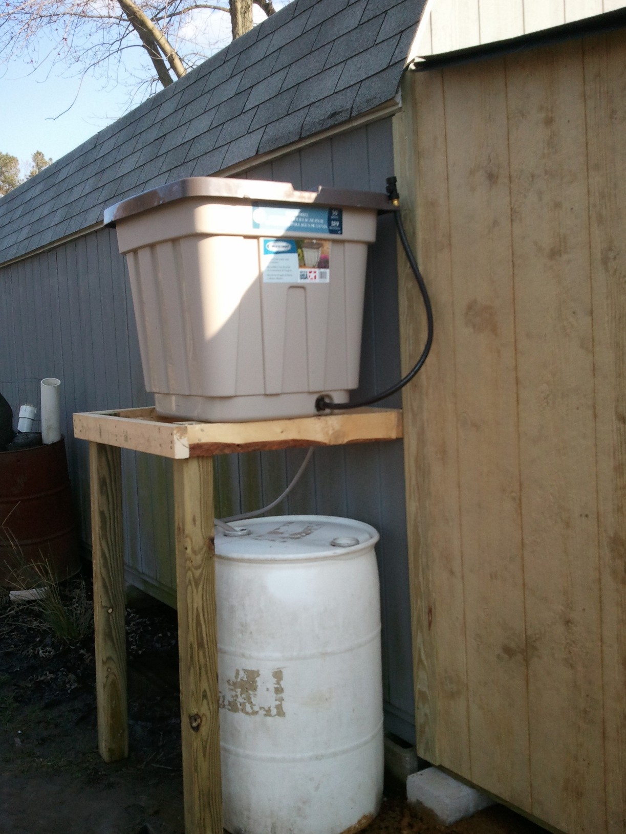 Our rain barrels make it a great way to water them. I use the bottom overflow for the ducks pool and clean out outside water containers. It really works great. We catch the rainwater off of the older shed.