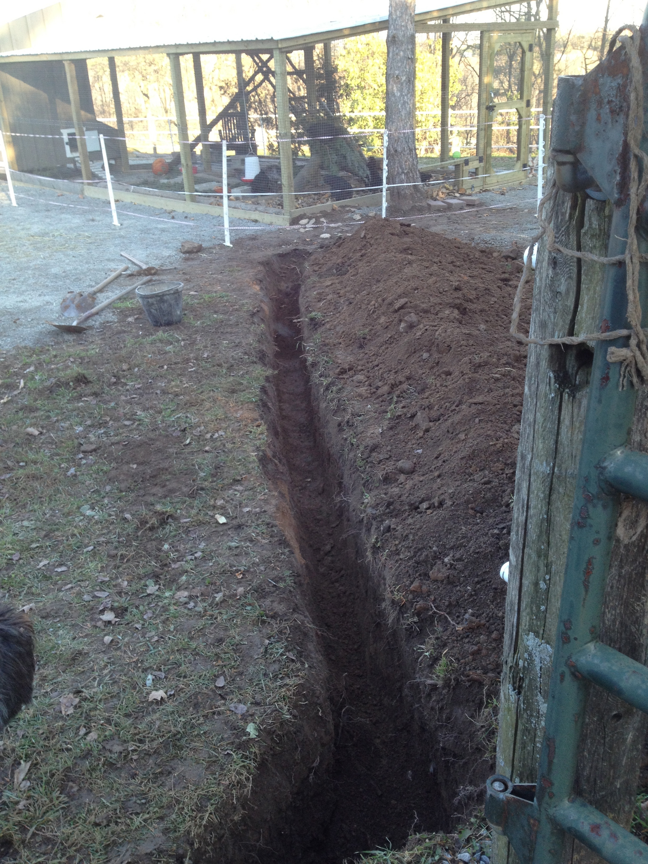 Part one of digging a trench for hydro and electric fence