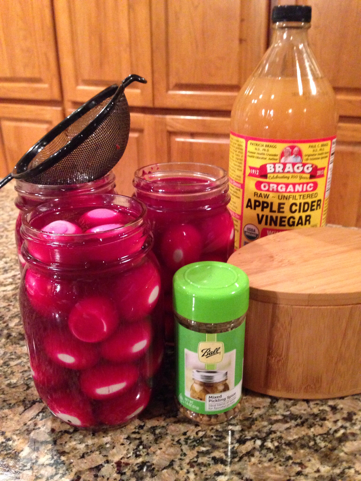 Pickled quail eggs in beet brine