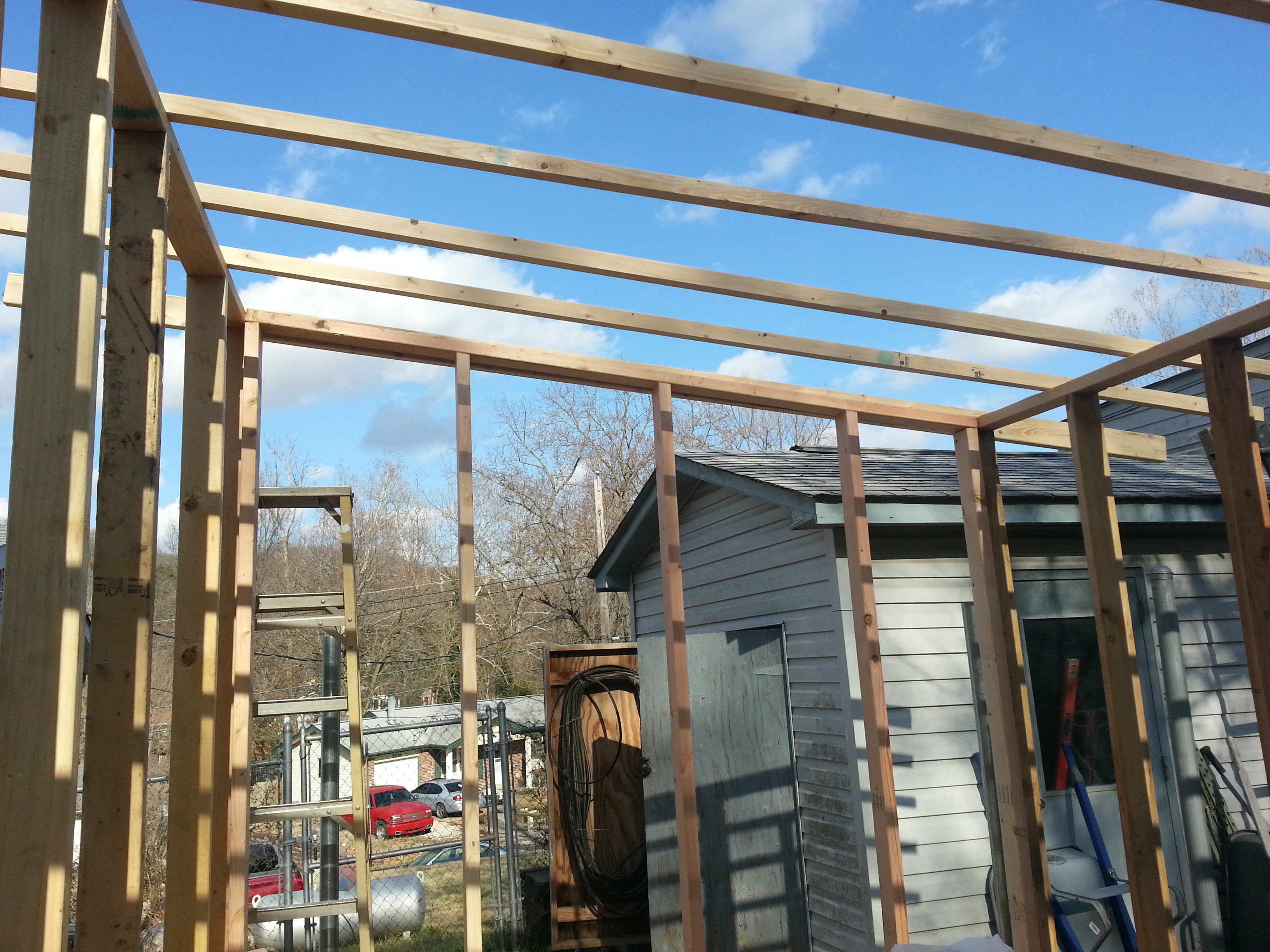 Placed them on the frame screwing them in with a 2 foot over hang on the front and back.