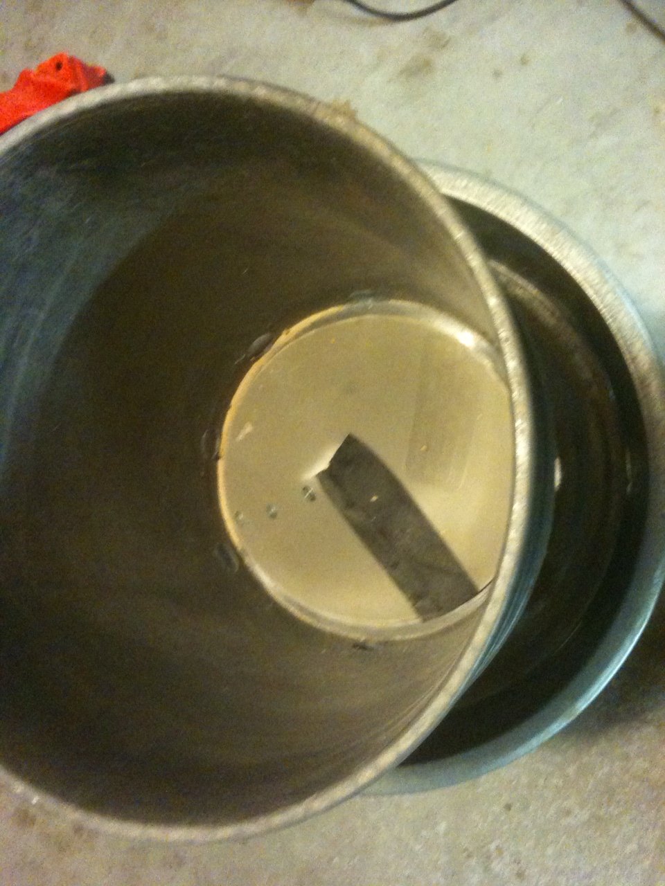 Plastic cone in bottom of bucket