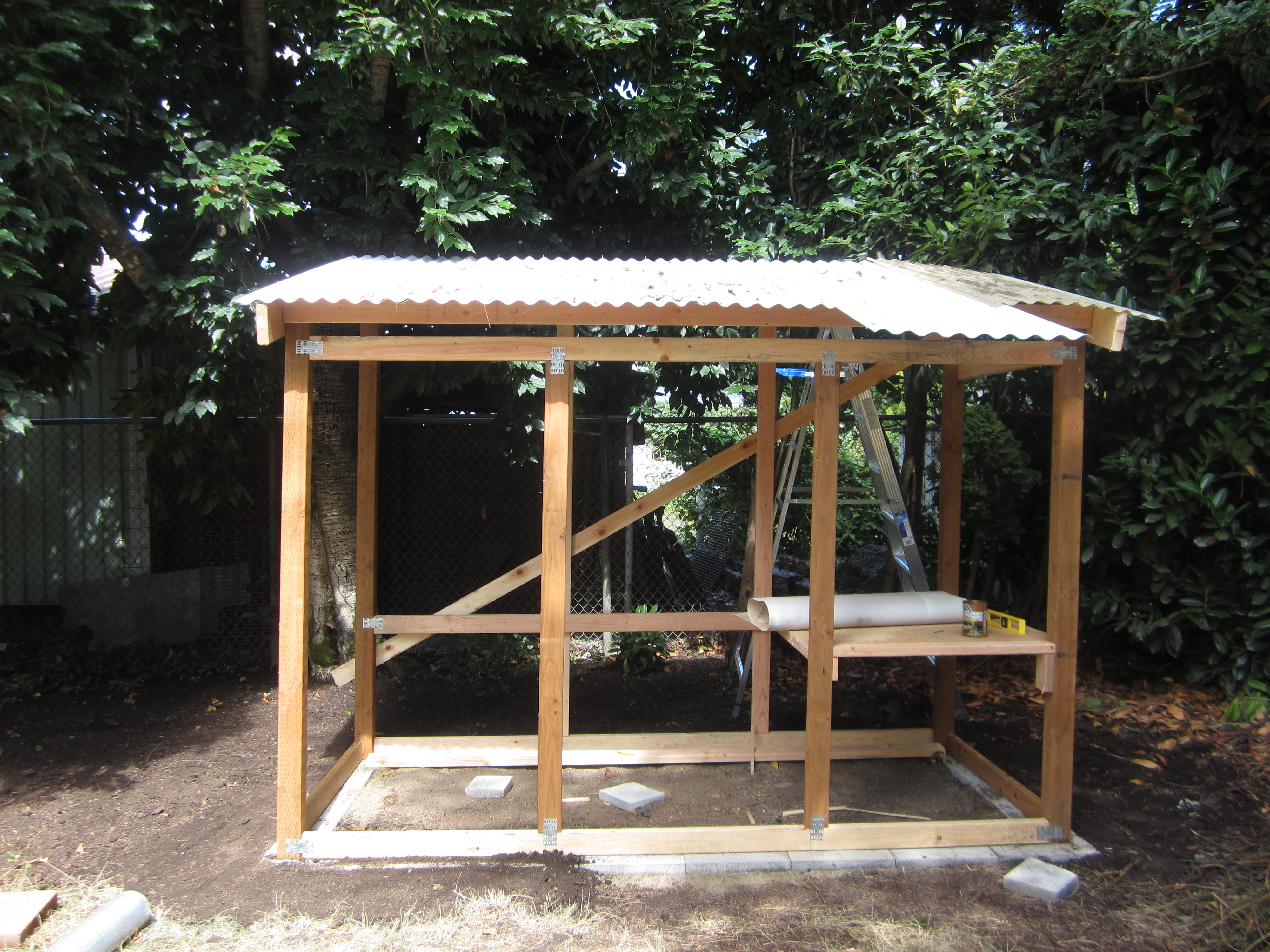 Plastic corrugated roof, with an overhang on one side