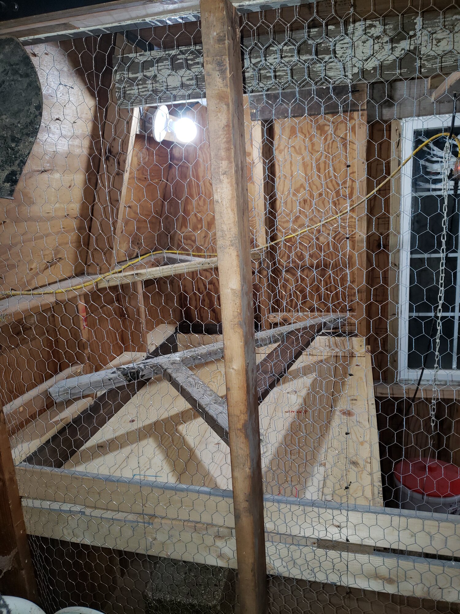 poop board installed outside view - shed coop build