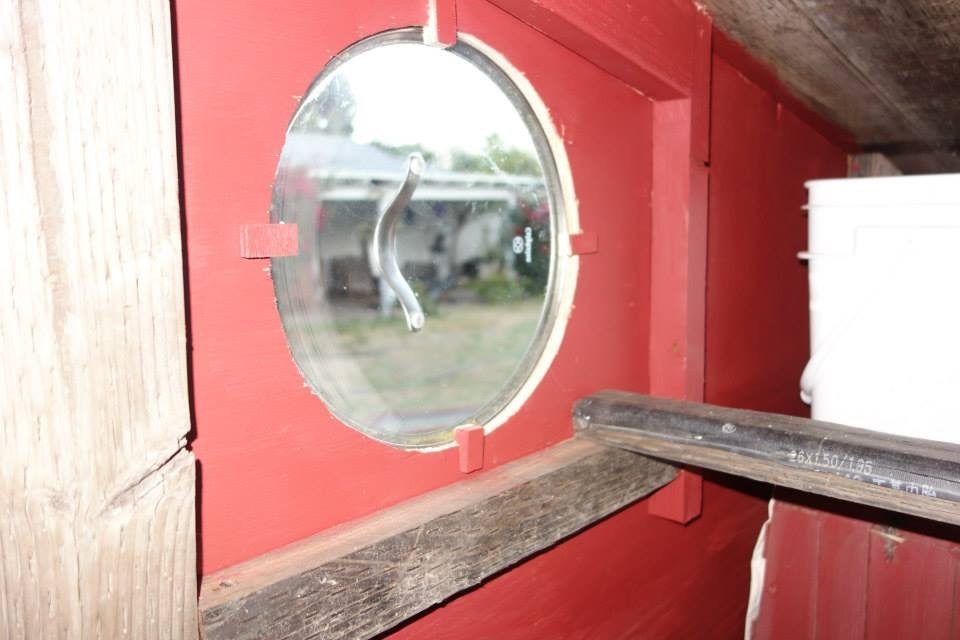 porthole window. The second roost went right under it.