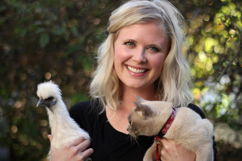 Proprietor Hasalyn with Yuna and Bebe the cat.