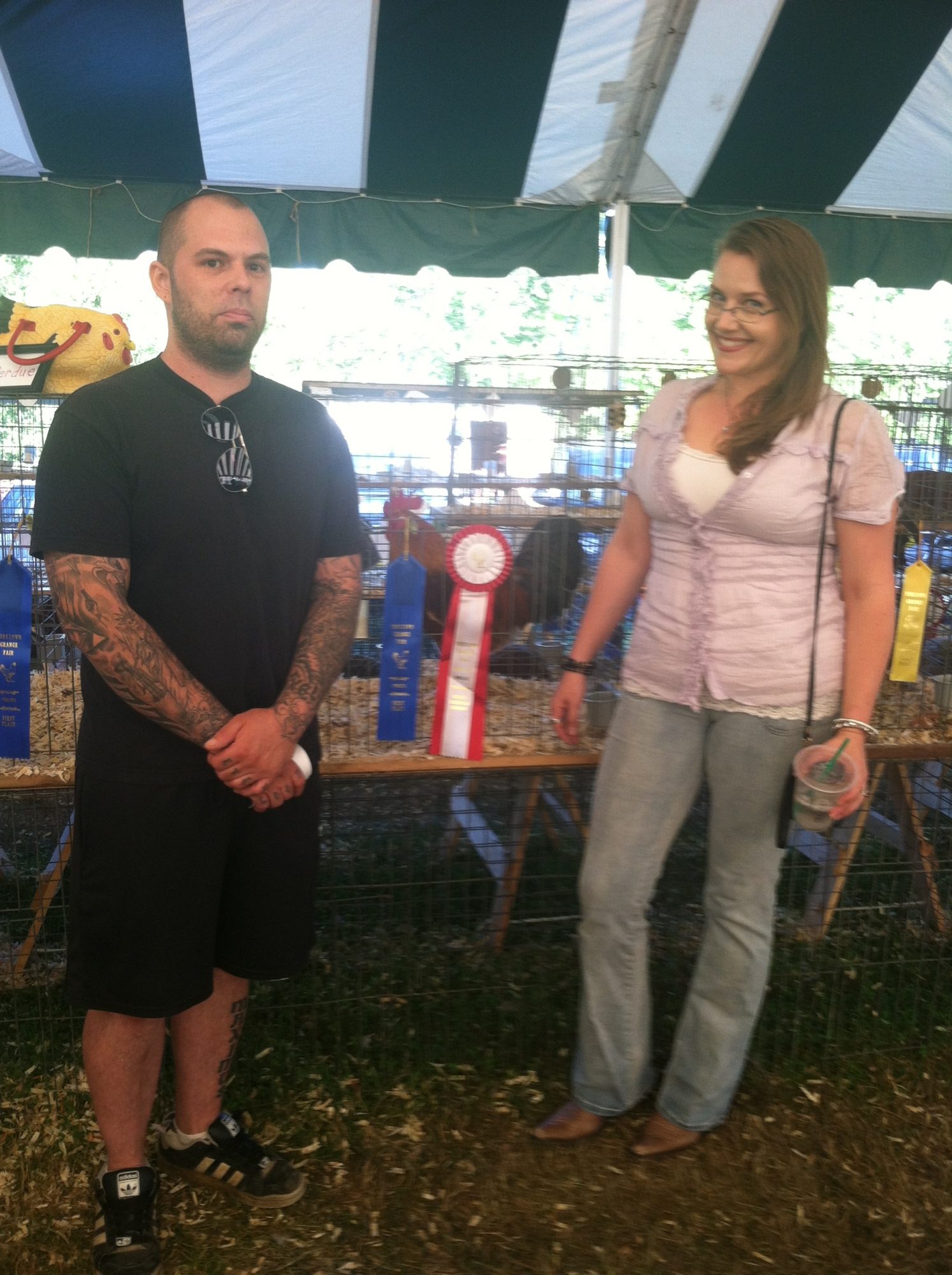 Proud Mom and Dad with our champion cock of show