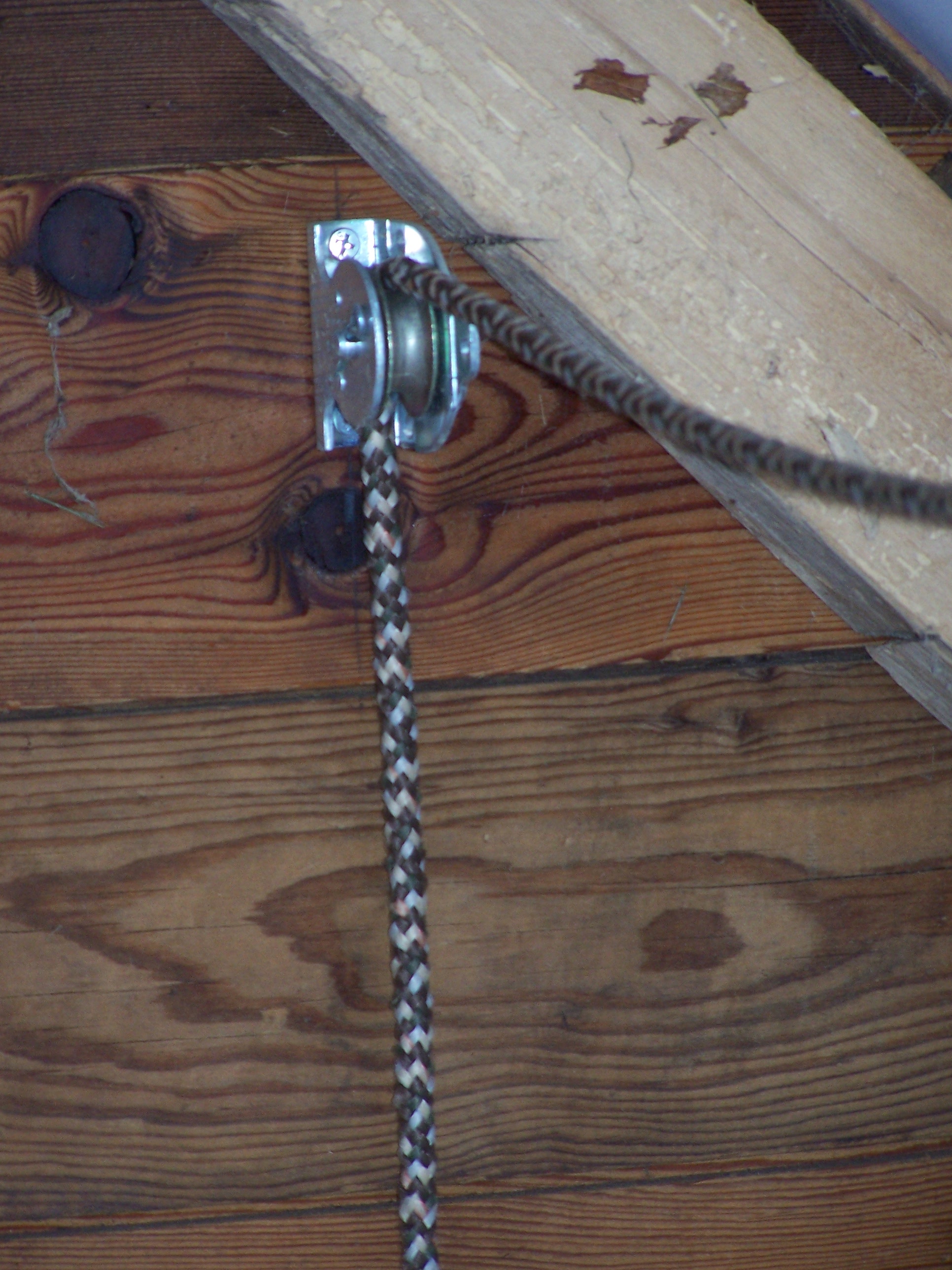 pully system for the pop door so you can open and close it without entering the run.