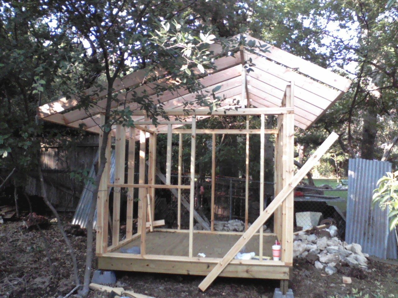 Ready for sheathing or siding and a roof.