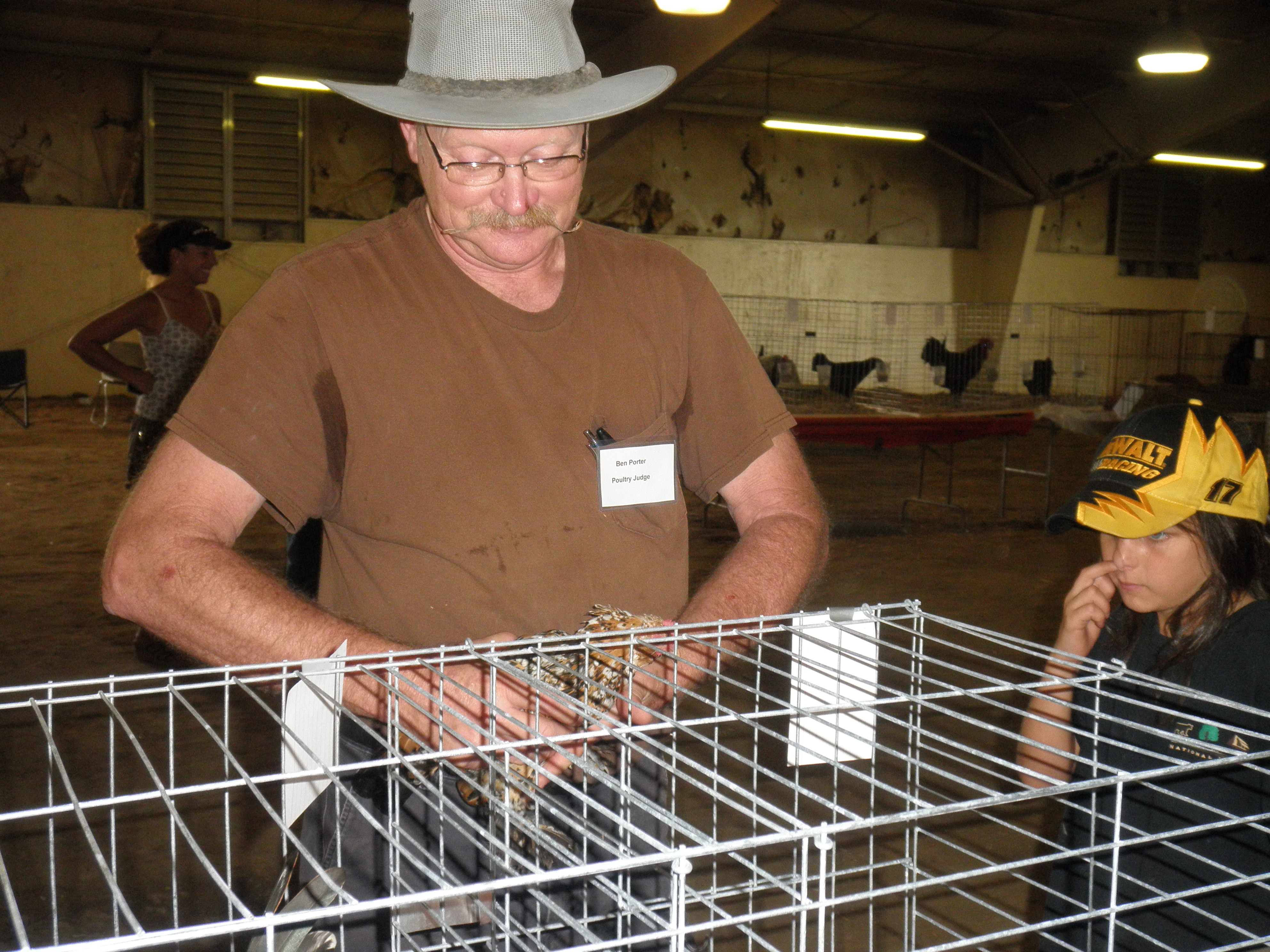 Red liked being out of his cage and didn't want ot go back in.  Note to self:  work with birds before show so they don't mind being handled