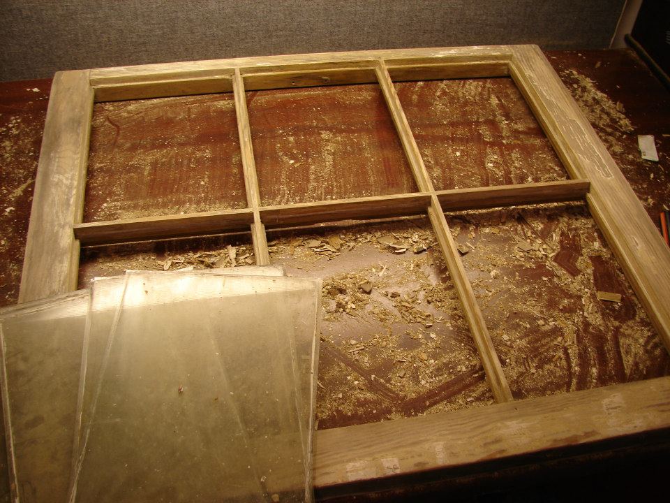 Refurbishing the outside window. Windows on three sides.