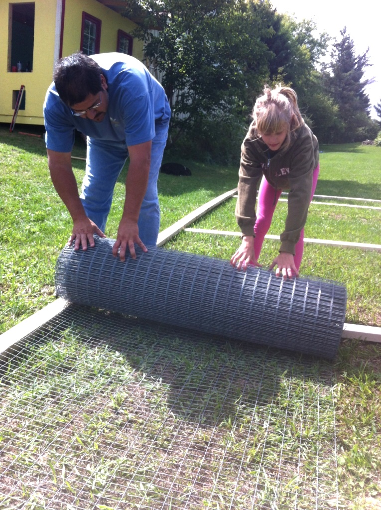 Rolling out the wire for the fencing