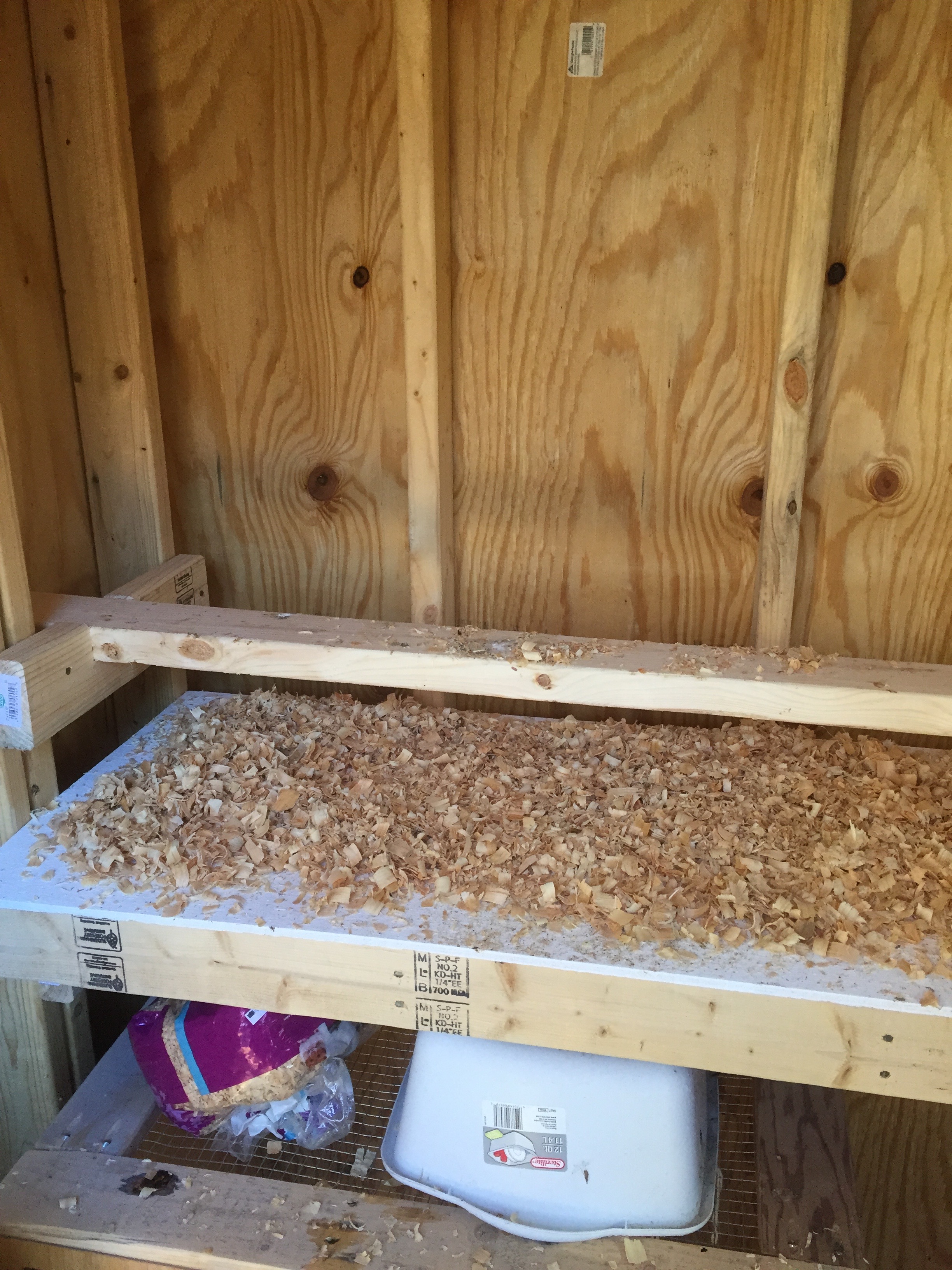 Roost bar is a simple 2x4 on it's side.