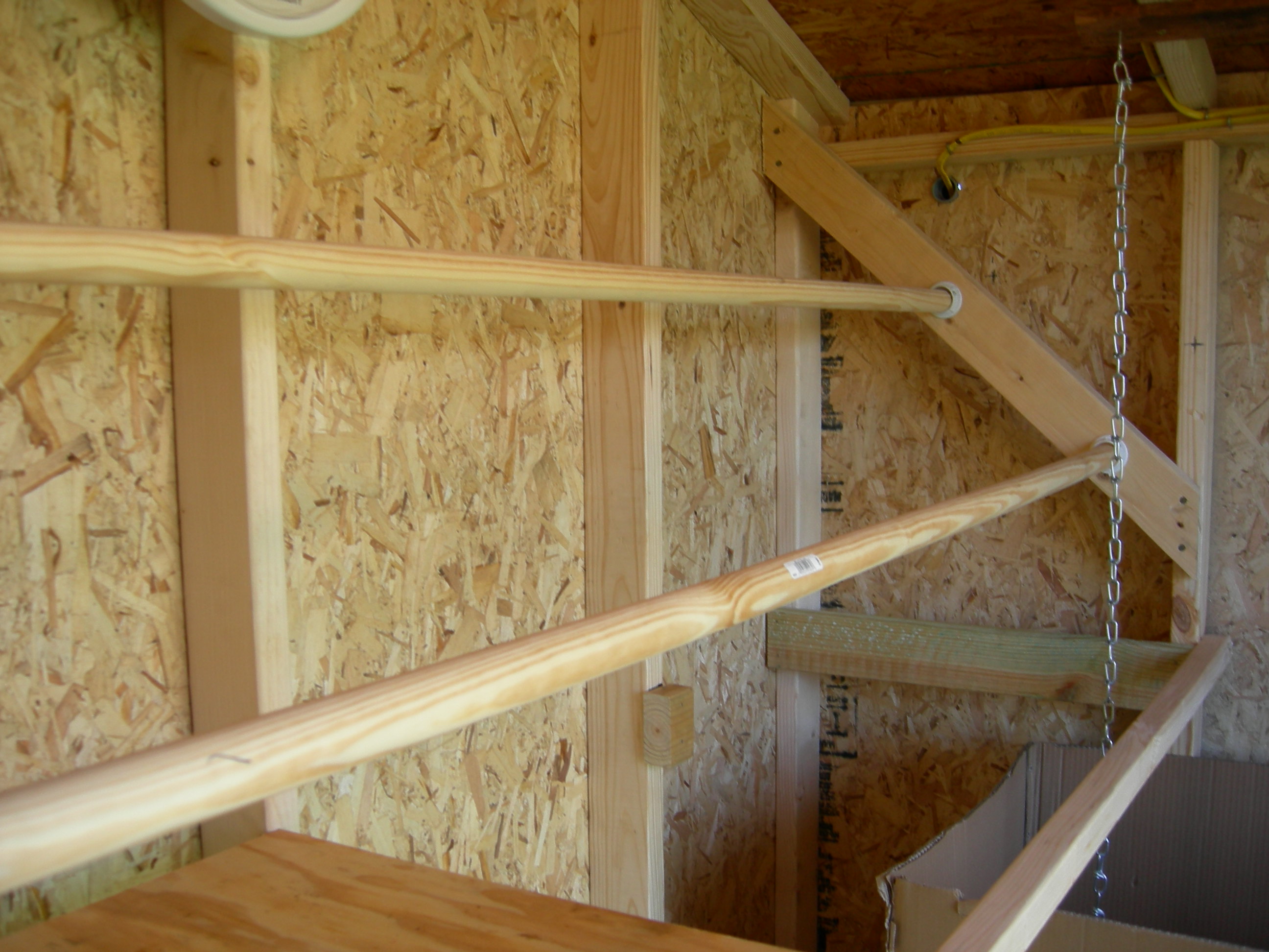 Roost Bars - Later we removed the second layer of roost bars and now just have the one. They were pooping on each other. Now they just poop on the dropping board. Much better!