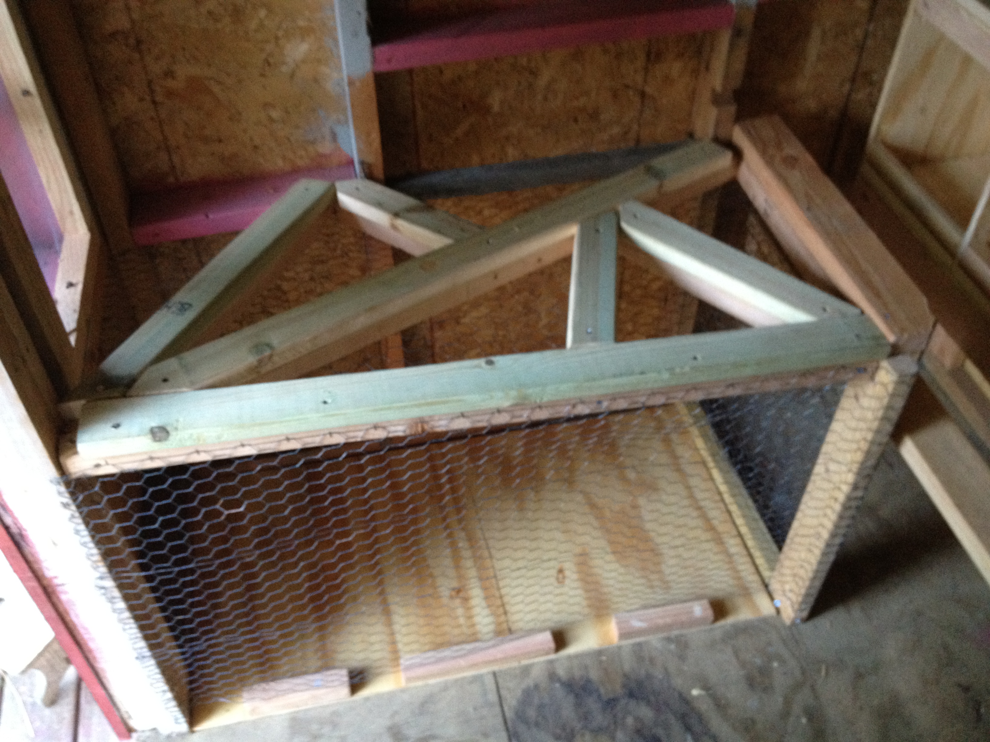 Roosting area with poop board