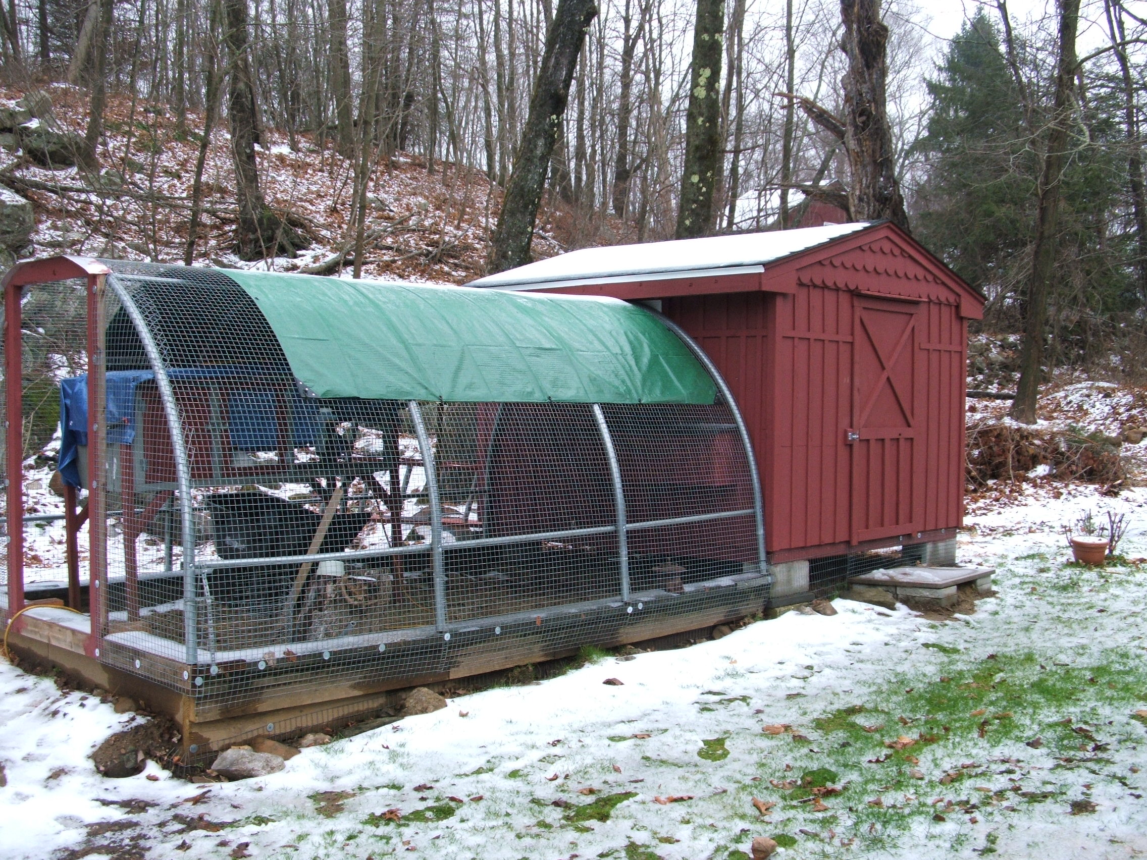 Run is  and old portable garage frame cut and bent to fit base which was the old sand box