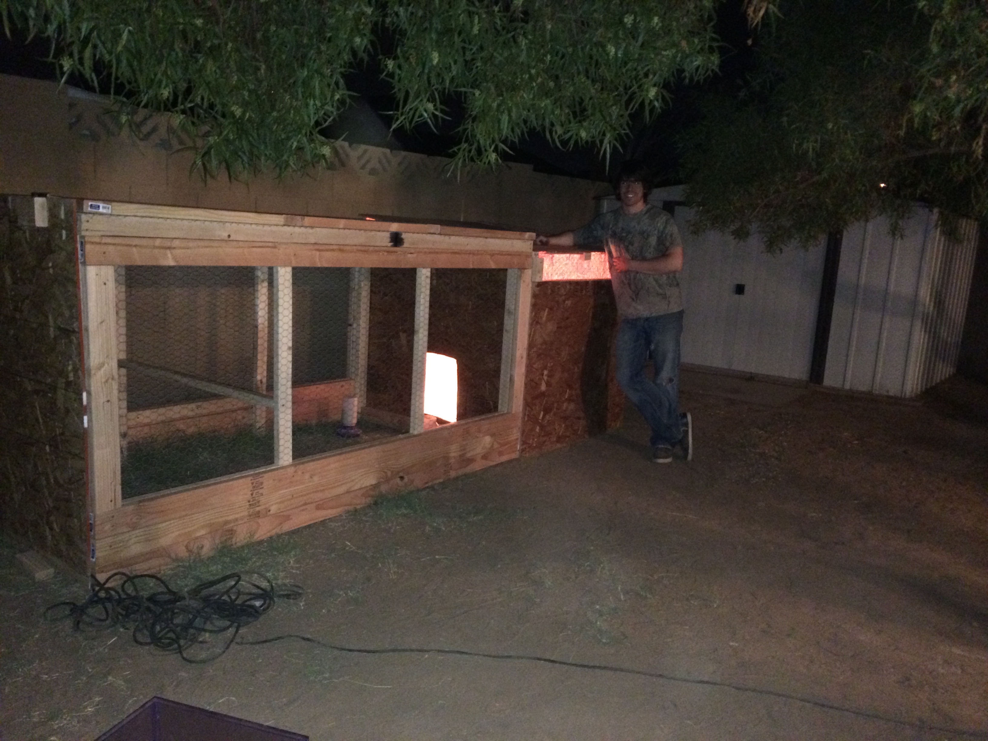 Second pic of my Brother Sheth posing with the new coop and run.