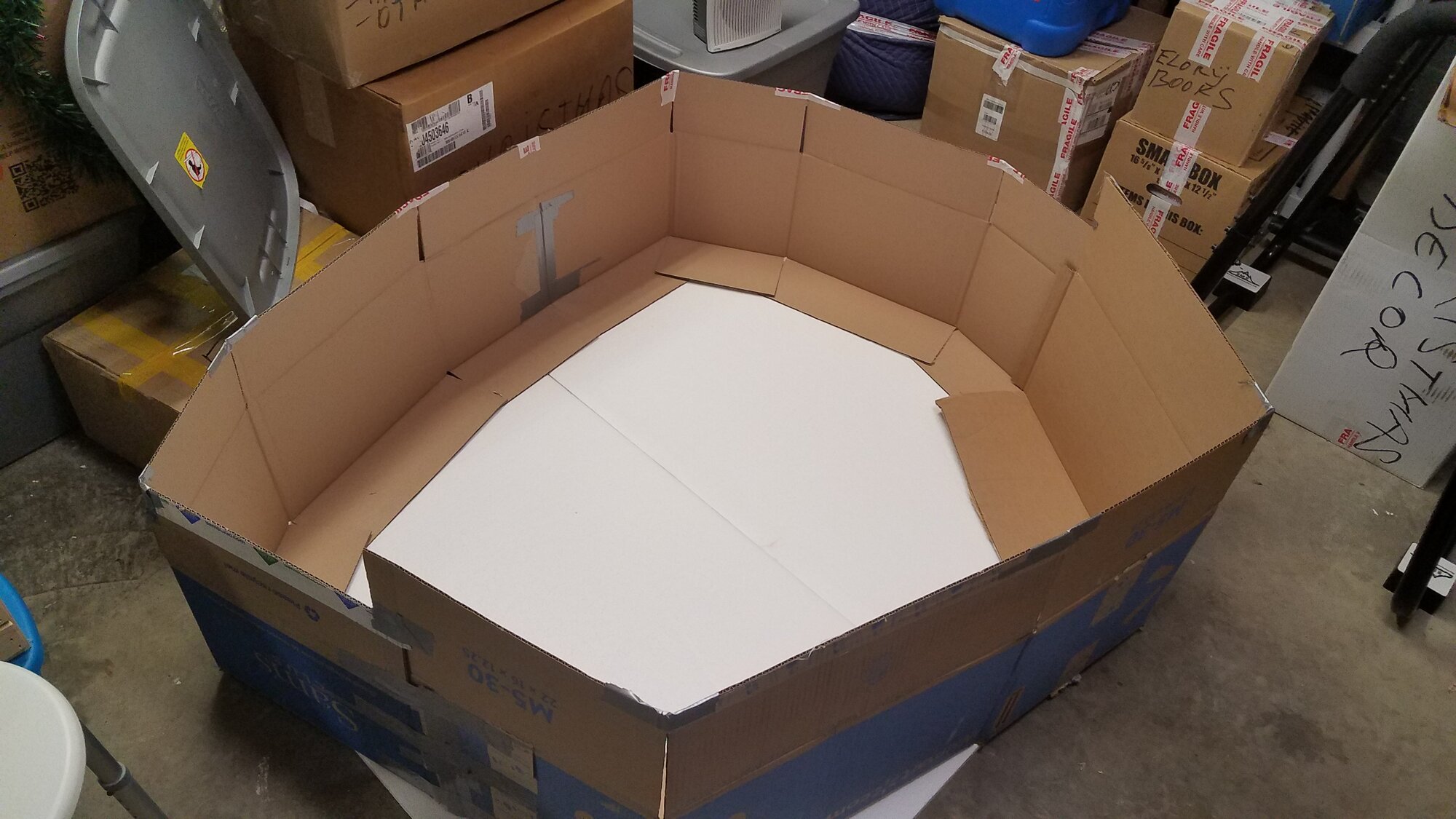 Self-made brooder: Cardbord boxes, Strofoam covered with a Tarp