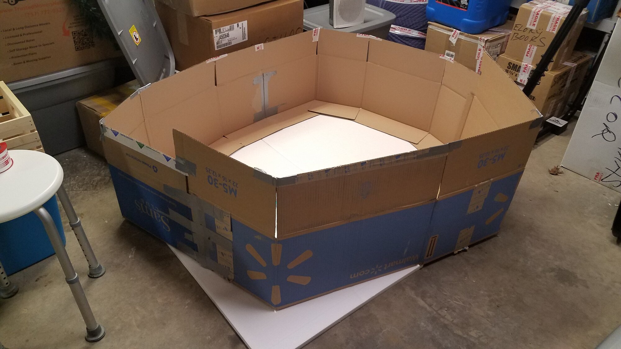 Self-made brooder: Cardbord boxes, Strofoam covered with a Tarp
