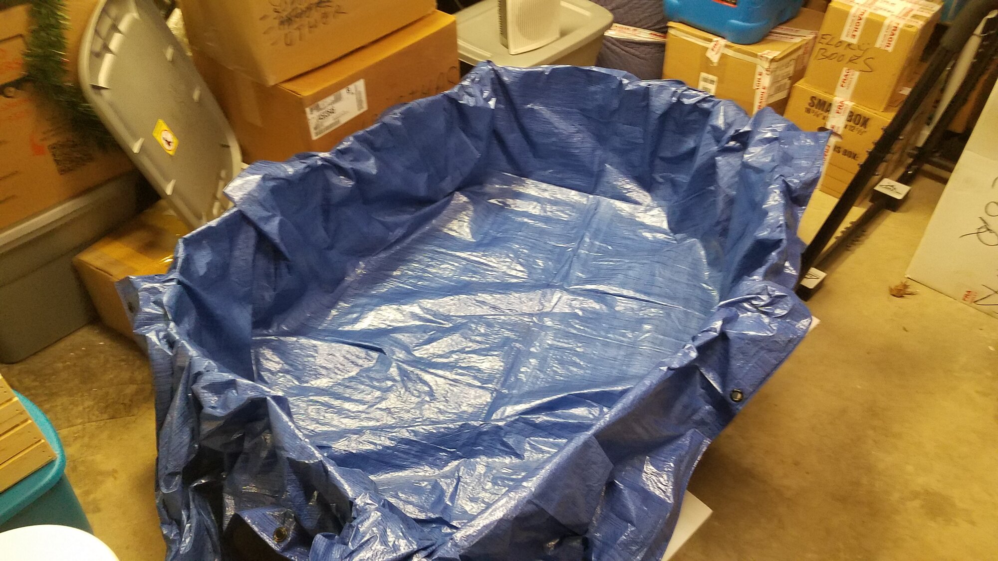 Self-made brooder: Cardbord boxes, Strofoam covered with a Tarp