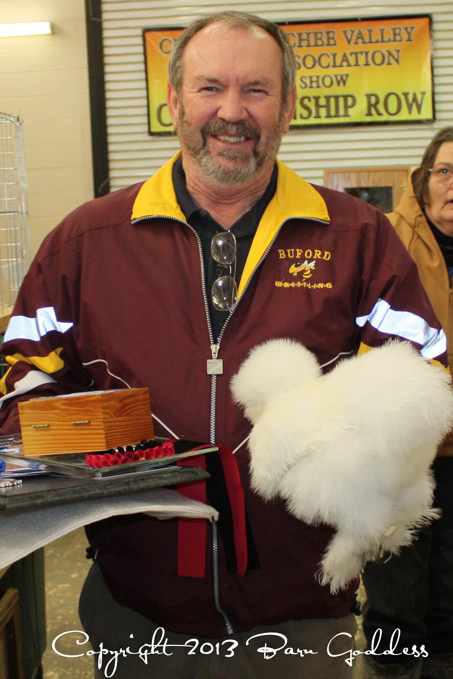 Shorty Polston with his Best of Breed and Champion Featherleg pullet at Newnan, Georgia 2013