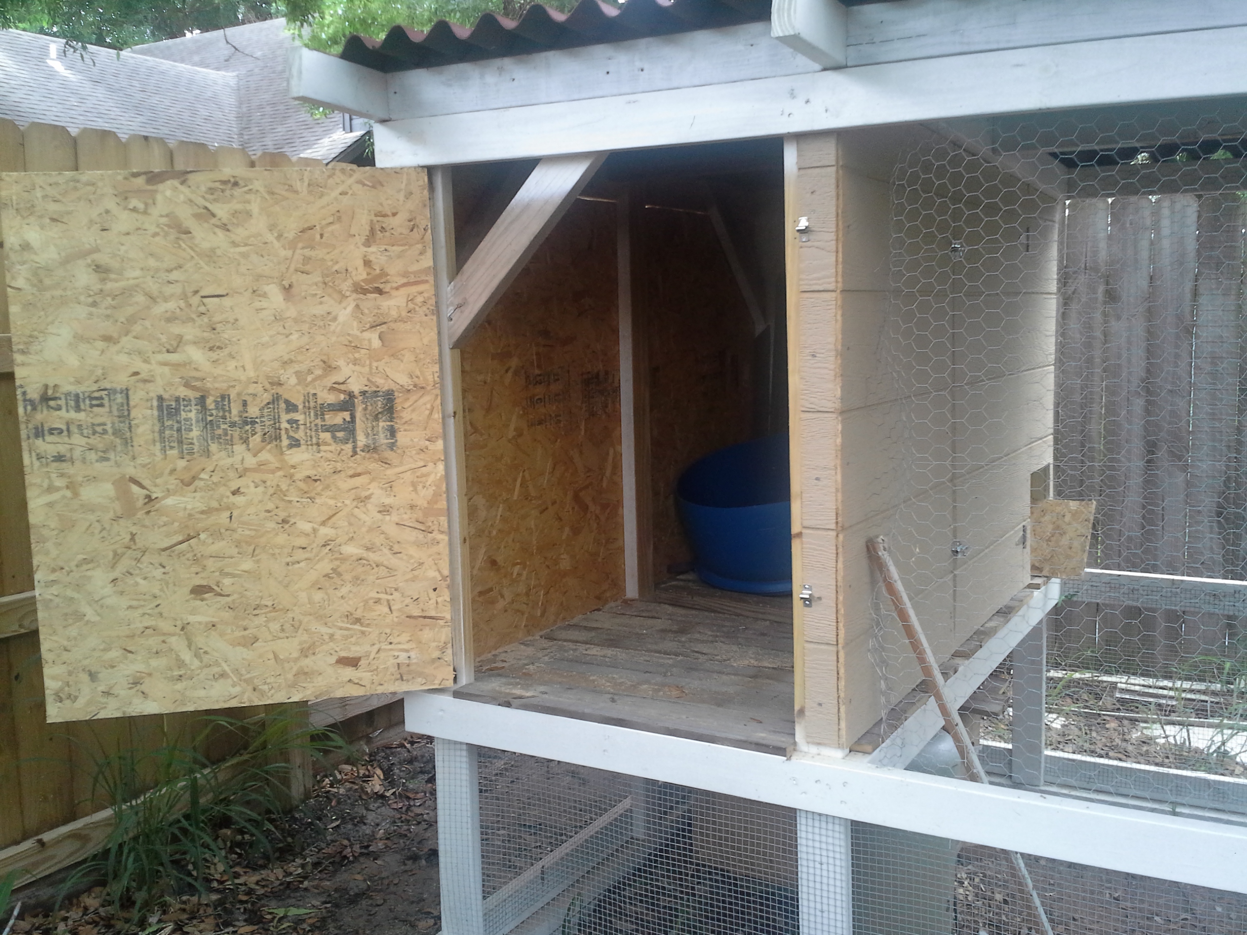 side door, will have nesting boxes & a storage area installed