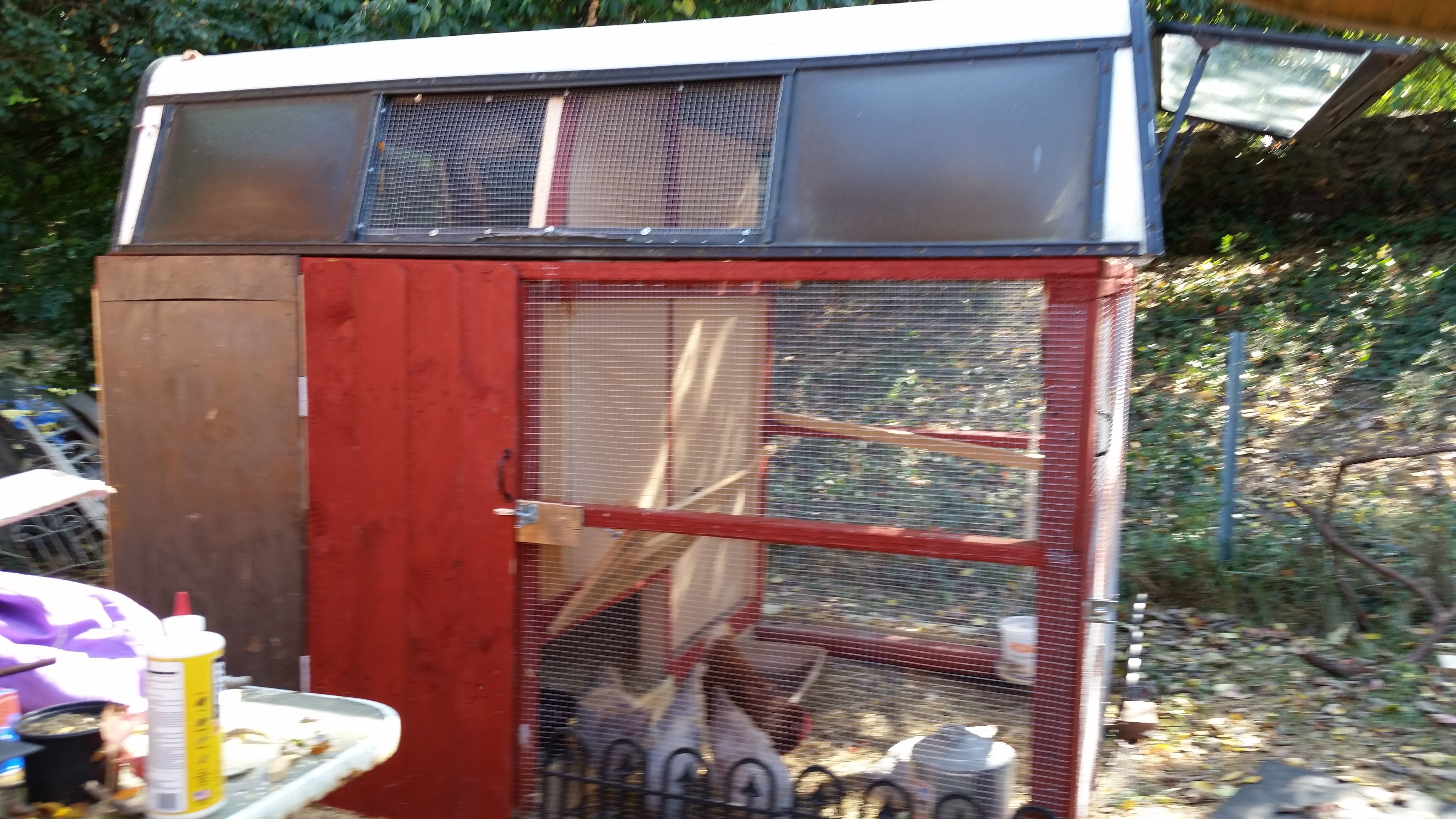 Side of completed truck camper top chicken coop
