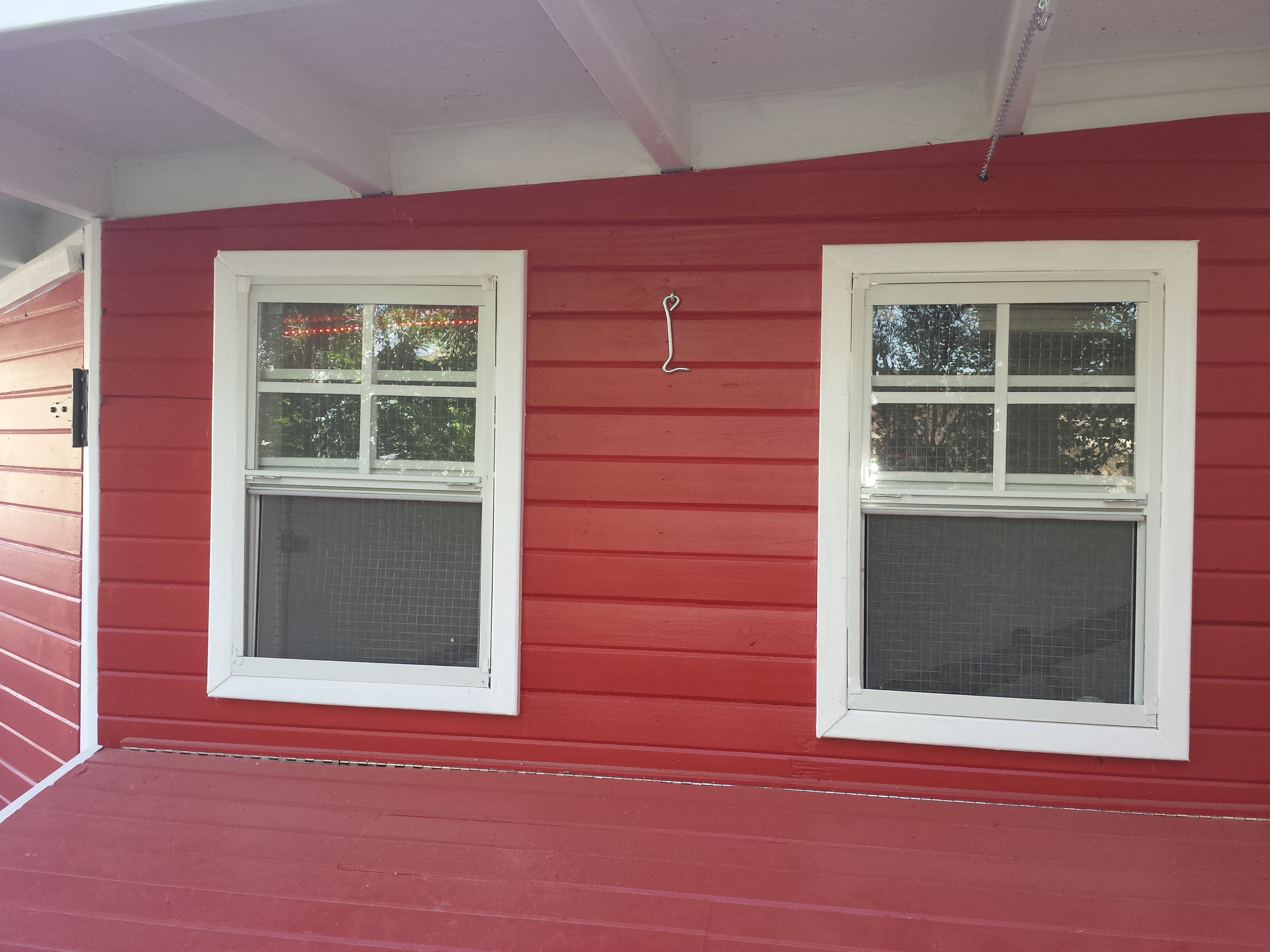 Side of coop. the 2 windows over the nest boxes
