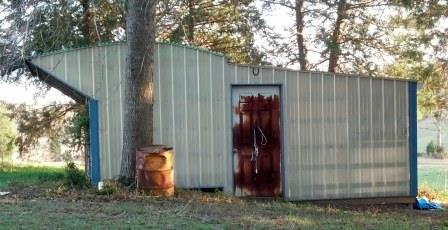 side view door is to the lower level where brooder shelf is