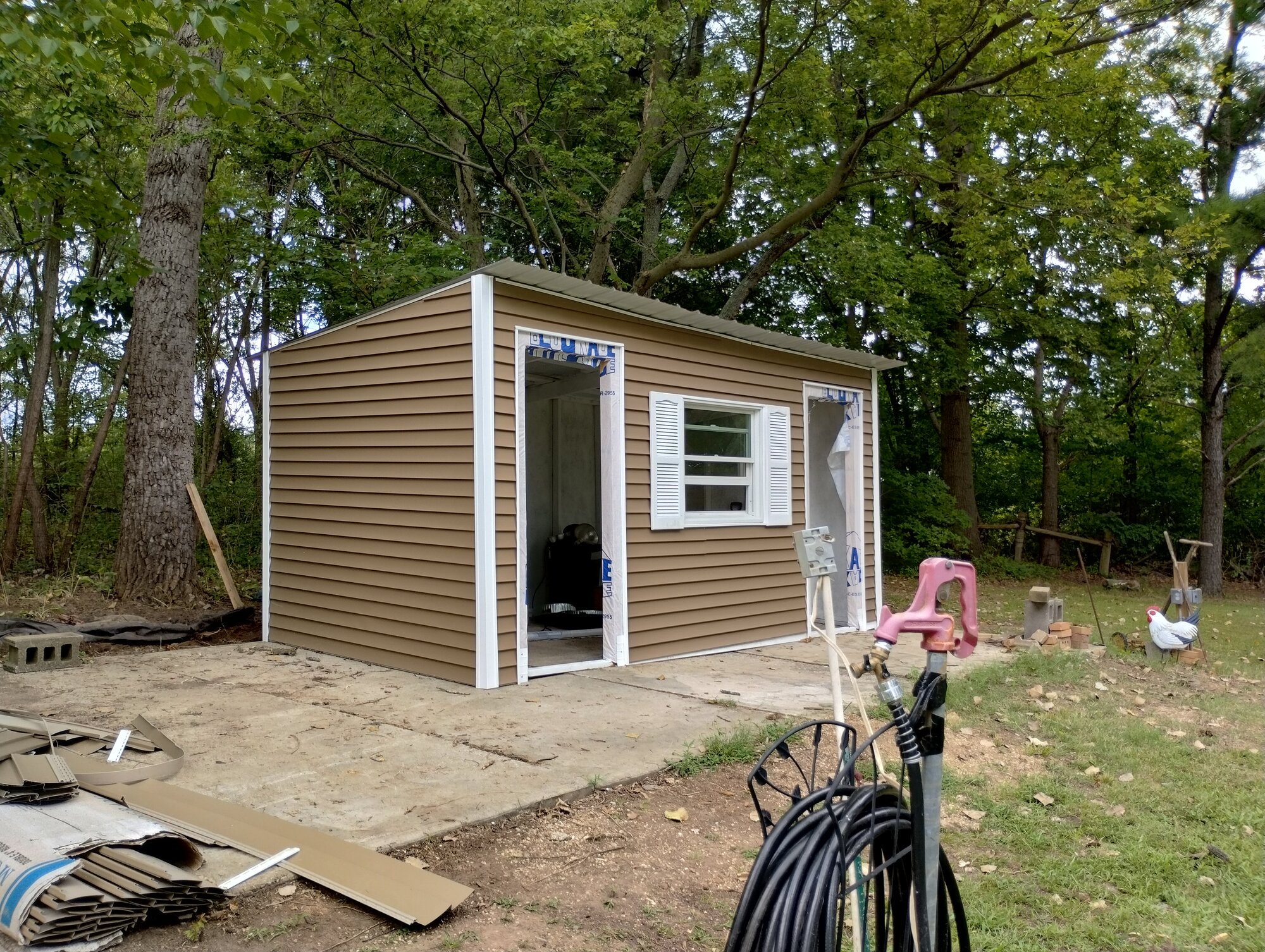 Siding up, shutters on