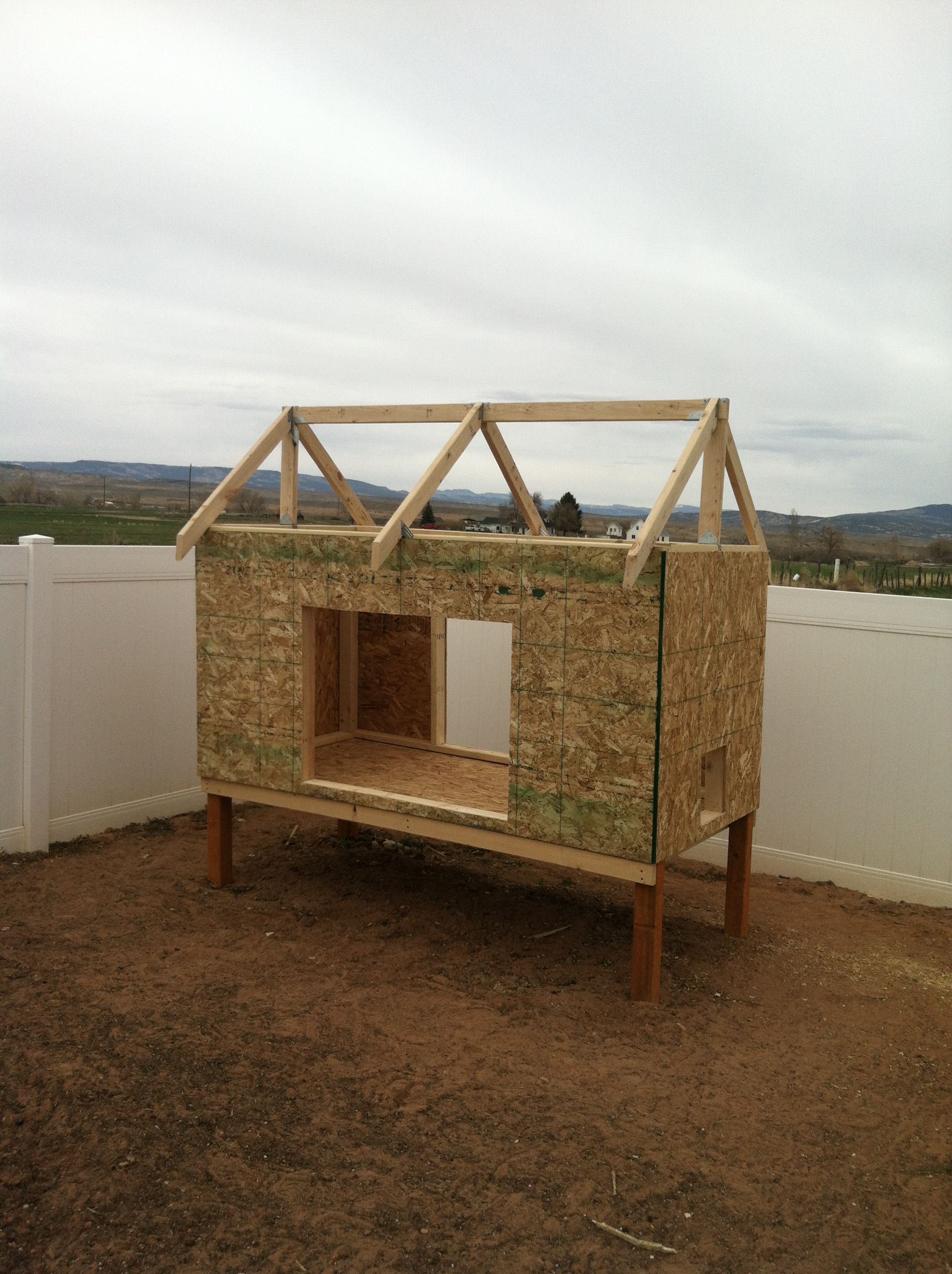 Simple A frame roof.  8x4' design maximizes use of lumbar and reduces lumbar cost.    Should be well insulated for winter and provides good shade in the summer.