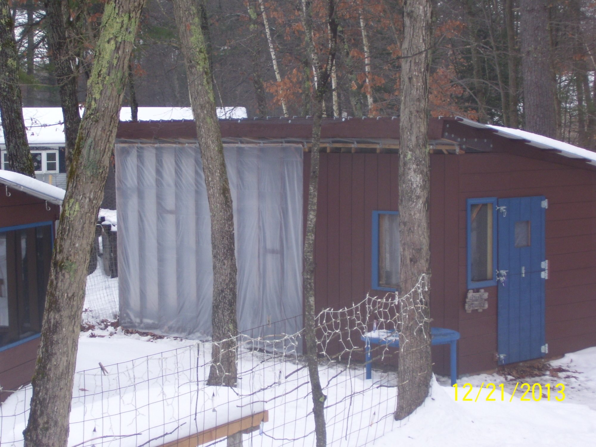 Snow was blowing in on the South and West sides, so I covered in plastic. Hoping to use some leftover plexiglass panels, in place of at least some of the plastic, next winter.