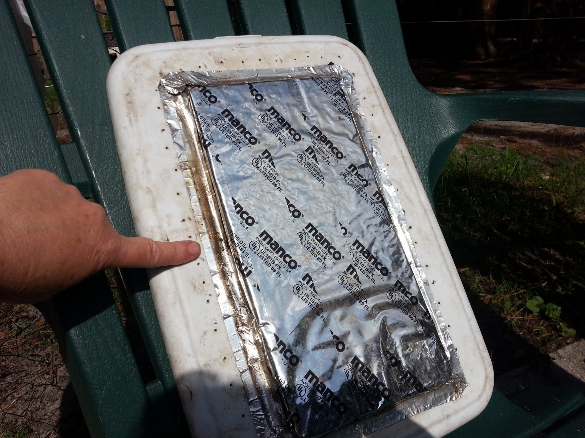Some insulation foam tsped to plastic lid and a good size for vent holes in this lid.