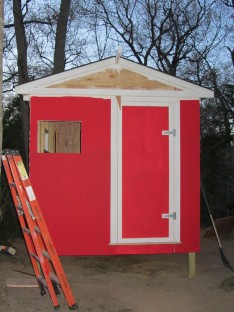 sorry not to many pictures of me building the door and window but I built the door out of 3/4 plywood and boxed it with 2x3s I used 1x4 for the door and window trim