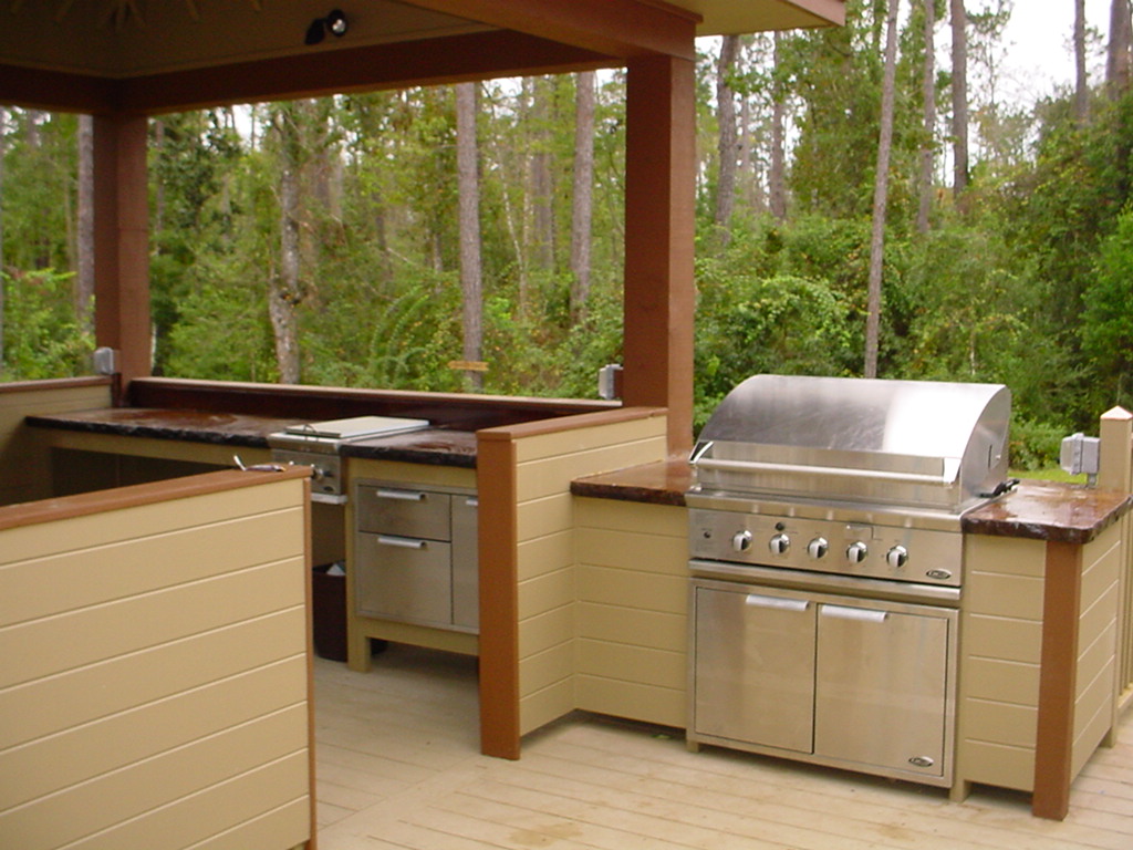 Stainless outdoor kitchen appliances installed on our custom built deck.