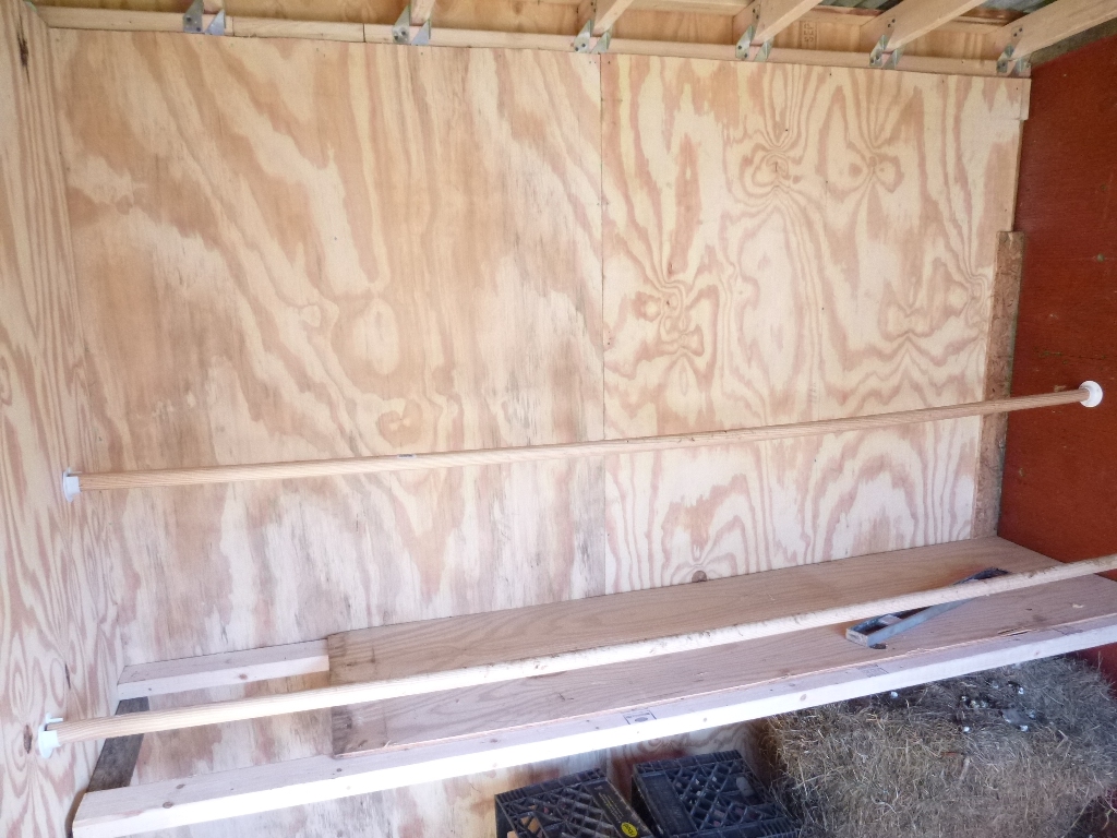 Step 16: Install roosts (and bruise palm of hand while screwing end things because the drill is dead) and poop board