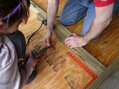 Take two piece of scrap 2x4's and screw them together