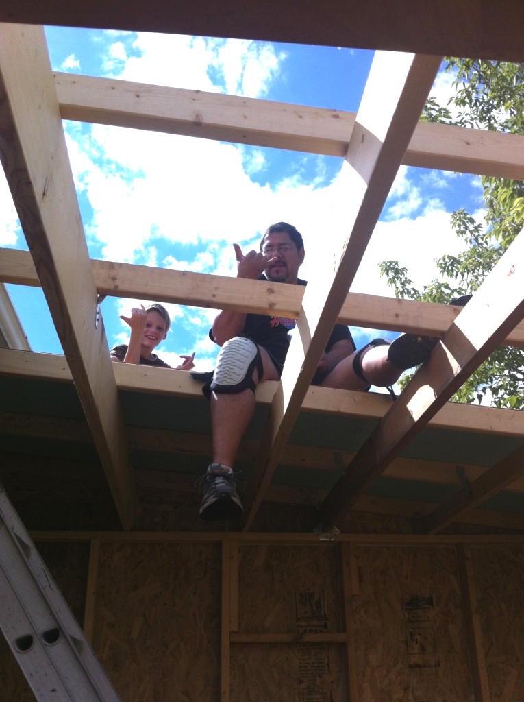 that is one strong roof. Guys taking a break- it was the hottest day ever!