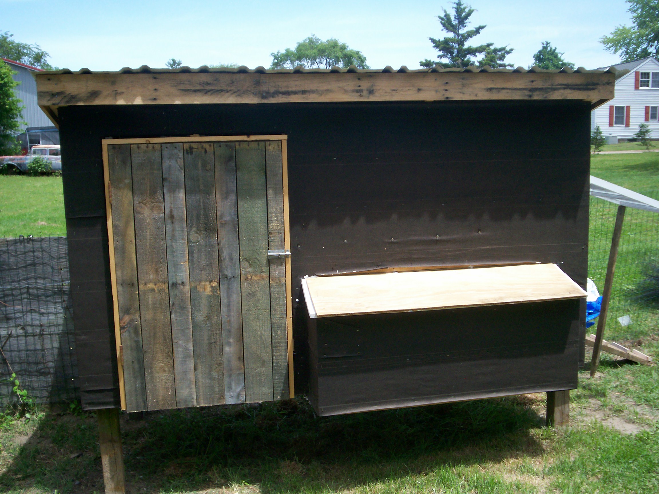 The access door for the feed and water and the 3 nesting boxes. Still