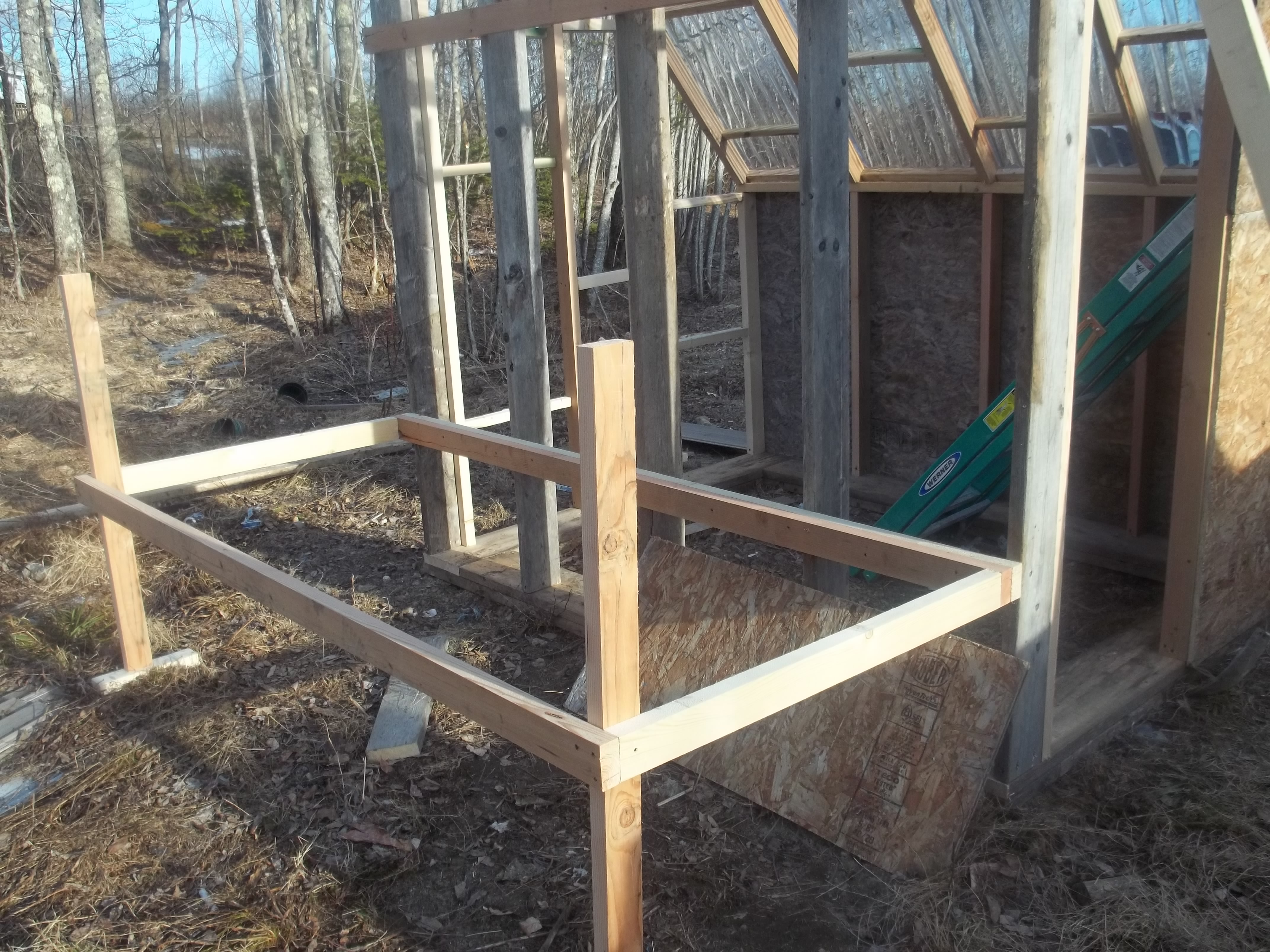 The beginning of the coop.  Remember that nailer??  Two feet of space below the floor for a covered run for the chicks, the box will be 4 feet by 8 feet, and 4 feet tall.  Should be plenty of space for all 14 of my birdies...