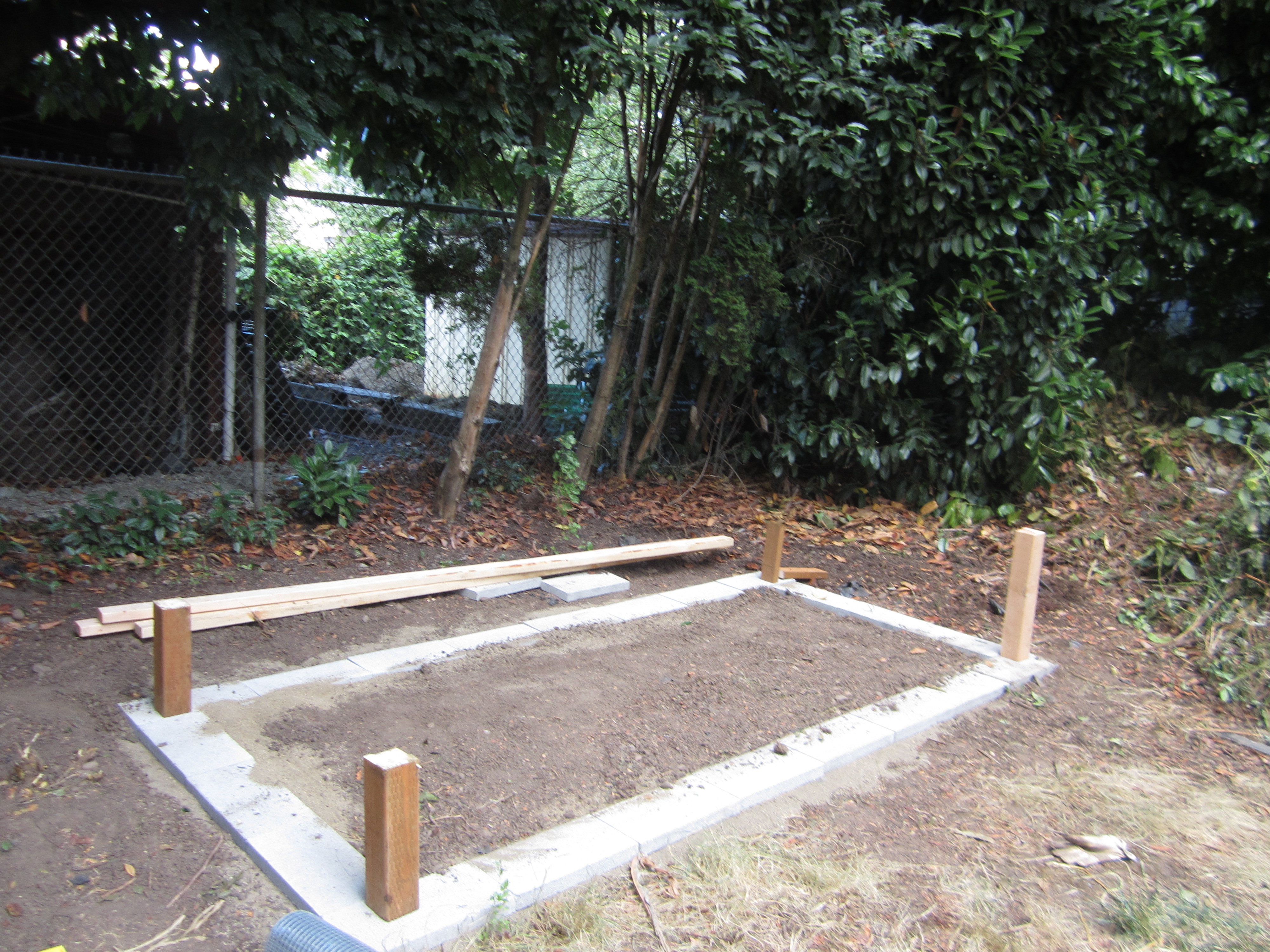 The brick base for the coop. **Originally we were going to dig the posts into the ground and it actually would have been better-you can see later that we had problems with the coop leaning that could have been avoided with just digging the posts in the ground instead.
