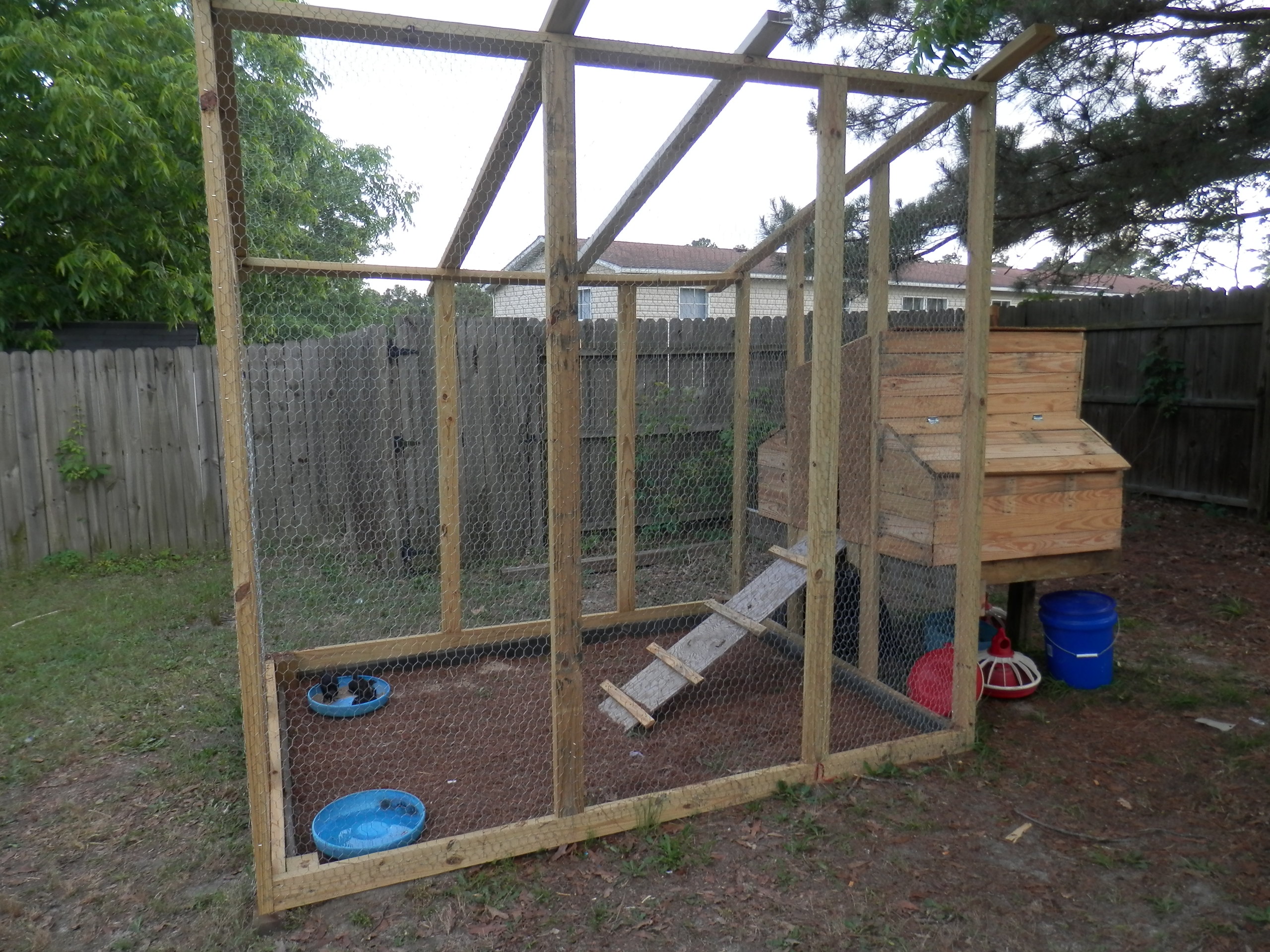 The chicken coop my husband and I built before we installed the tin roof.