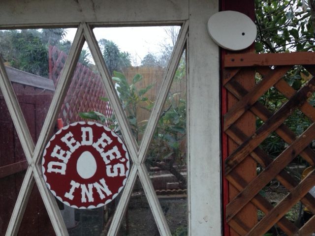 The door to the chicken yard needed a sign and an eggstraordinary latch... :0)