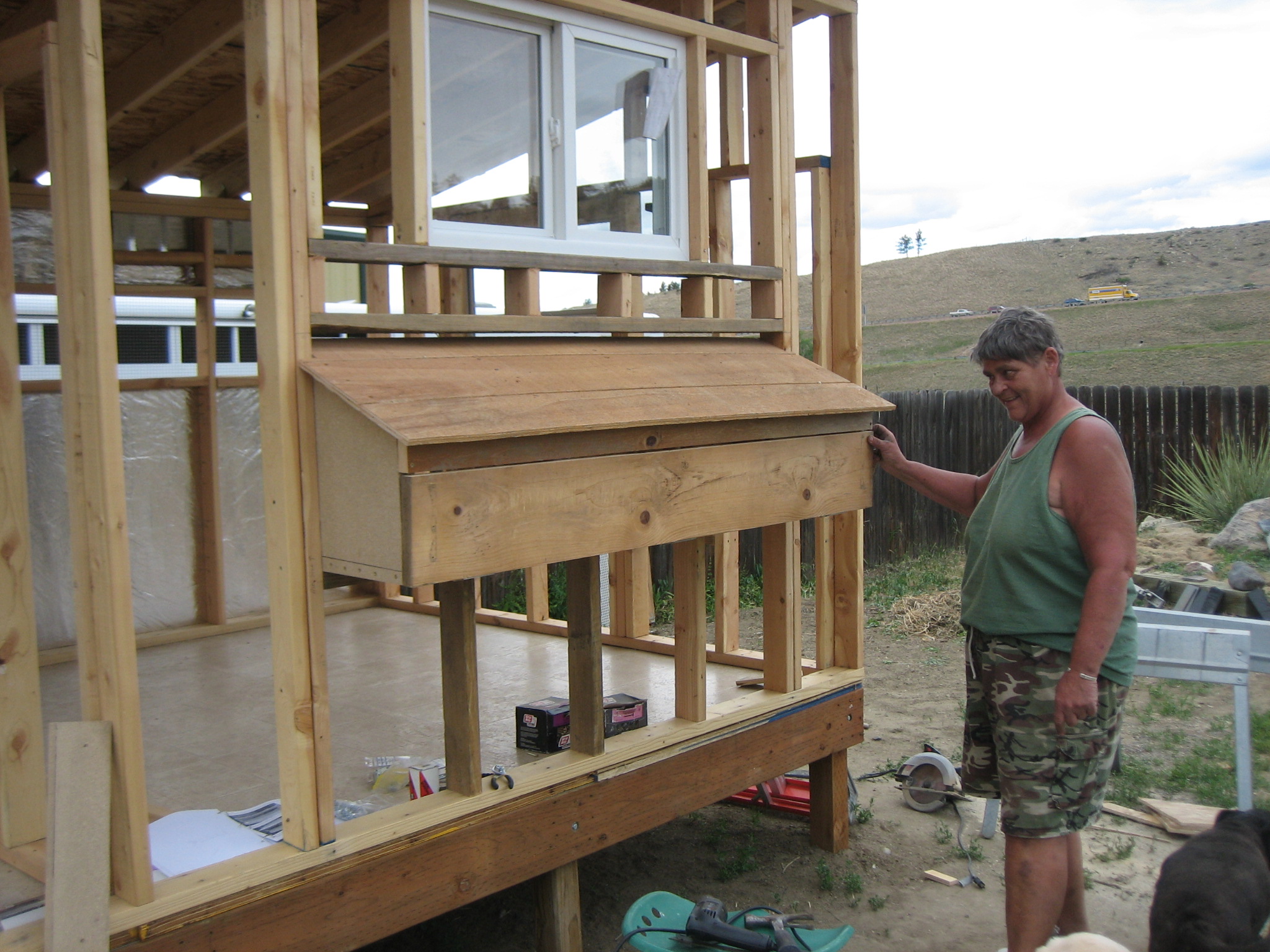 The exterior nesting box plans were from the many different versions that I looked at on BYC.  There are 4 nests accessible from the outside for gathering eggs.