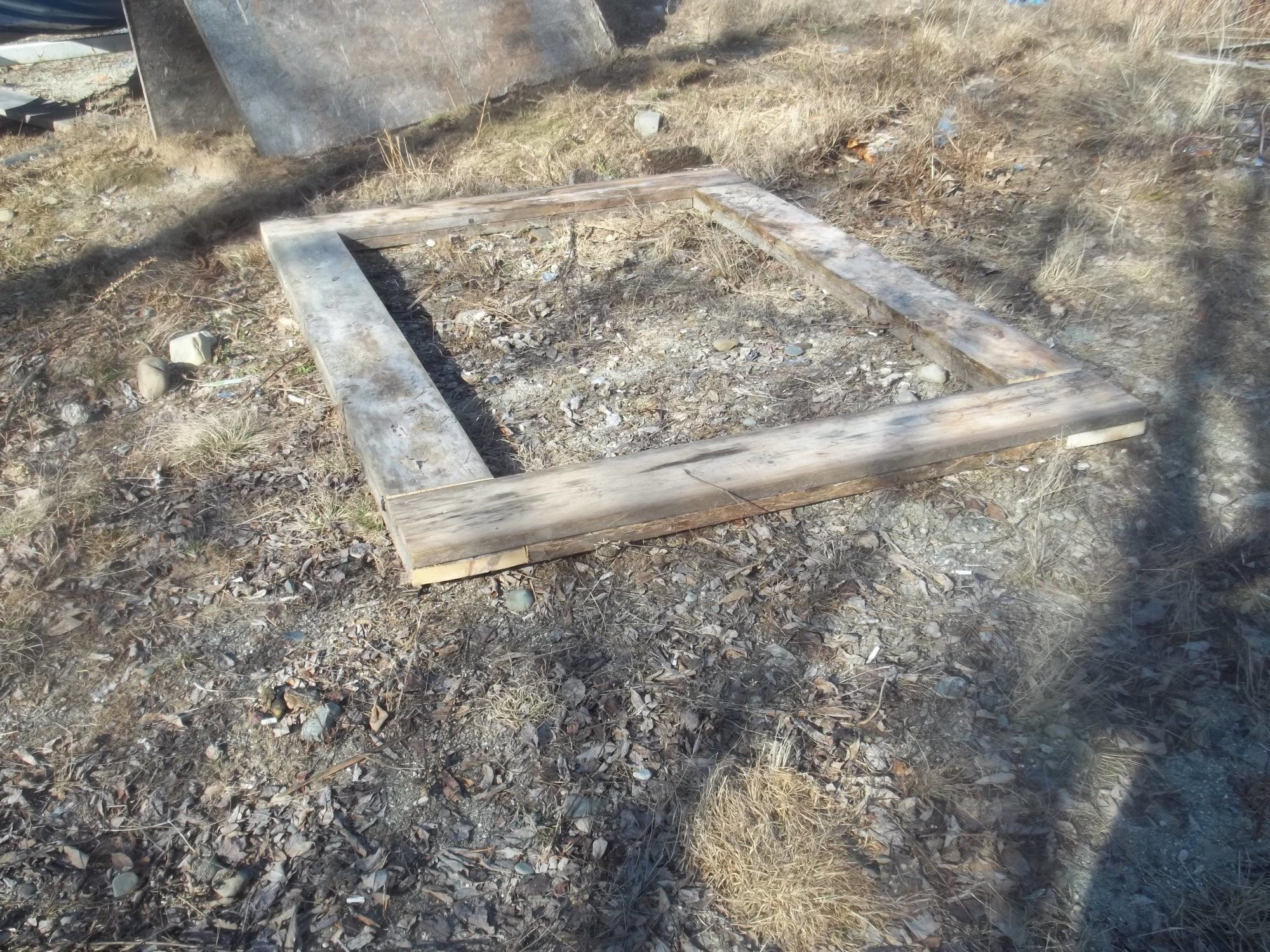 The foundation.  Had a few 2X10's kicking around after the snow melted, and put them to good use.  This is only the base for the green house 8 feet by 6 feet