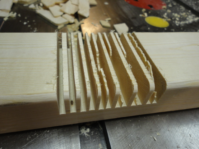 The frame of the house was made of 2" X 3" lumber. Most joints are half lap joints. I made mine by making multiple cuts on the table saw.
